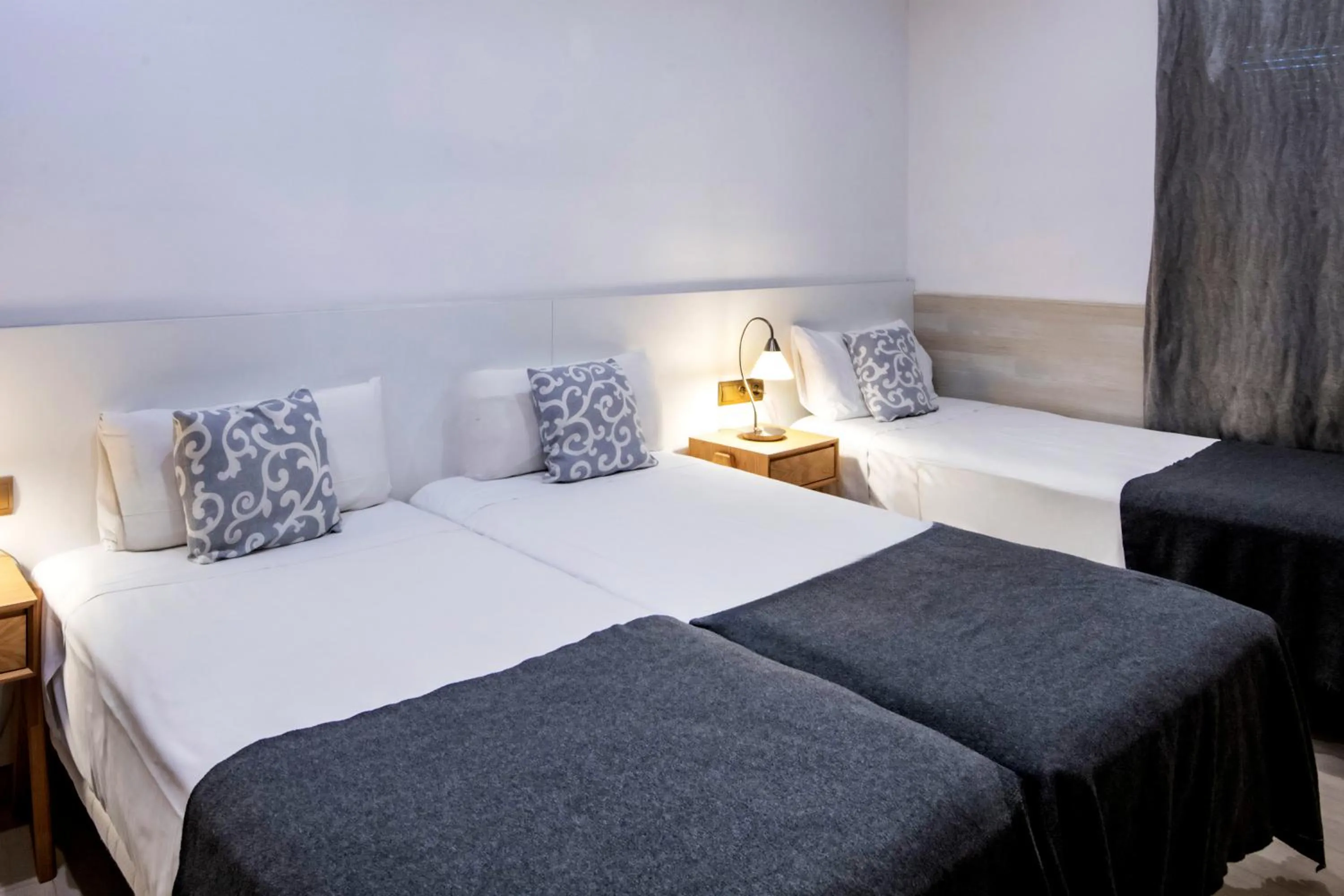 Bed in Aparthotel Rambla108