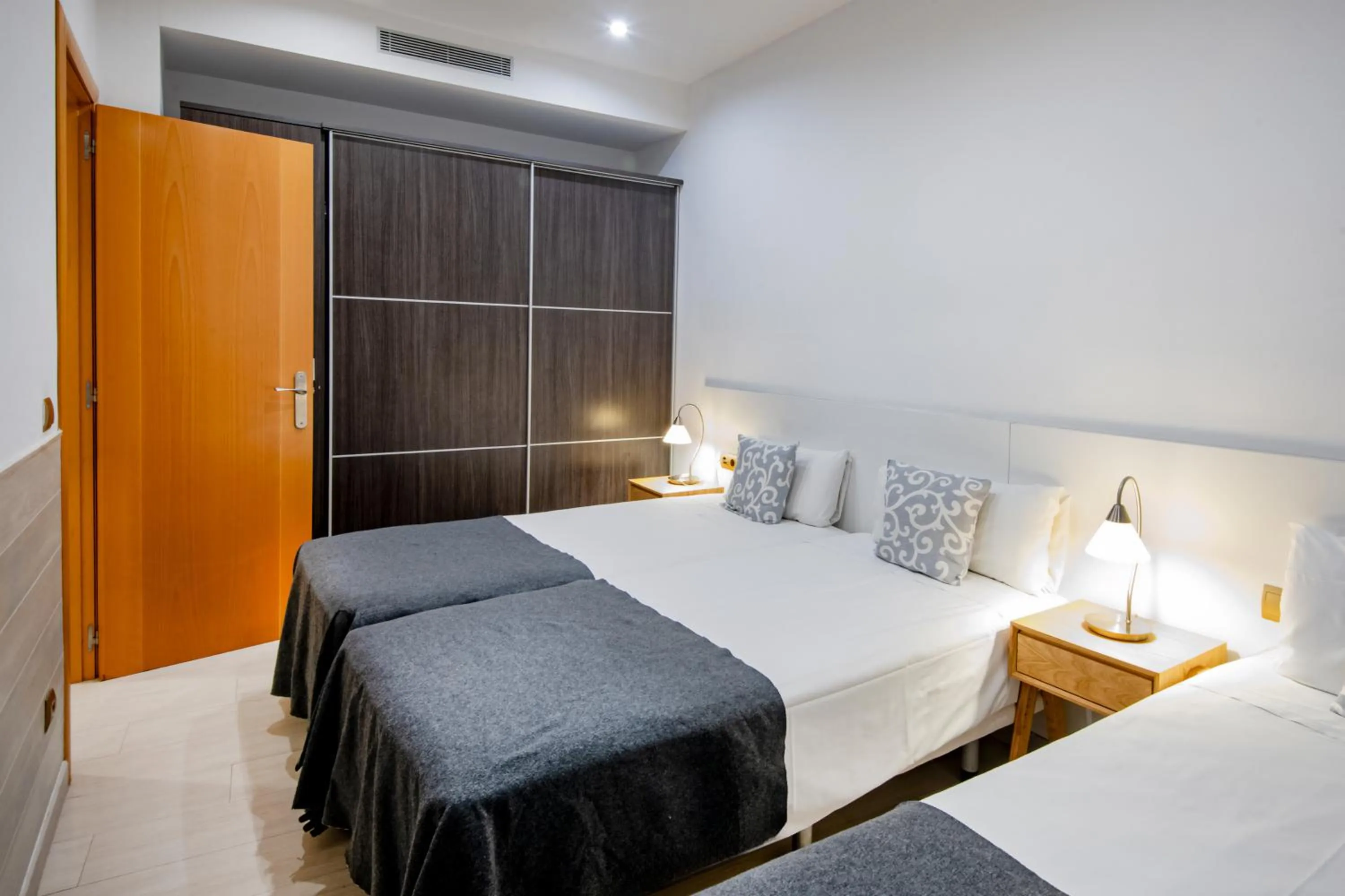Bed in Aparthotel Rambla108