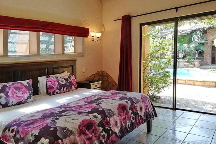 Bed in Stephan's Guest House