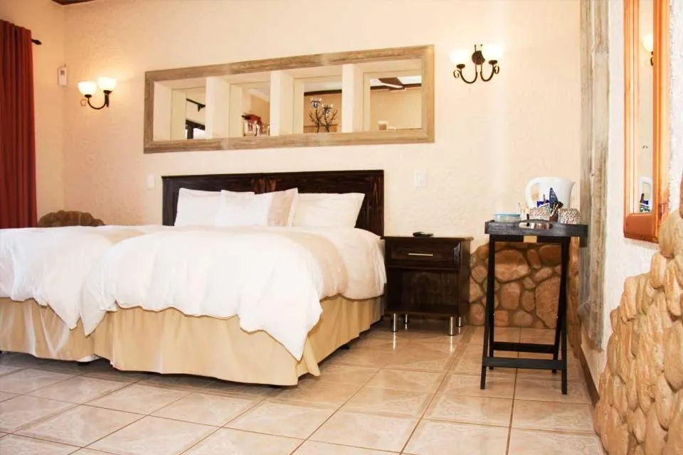 Bed in Stephan's Guest House