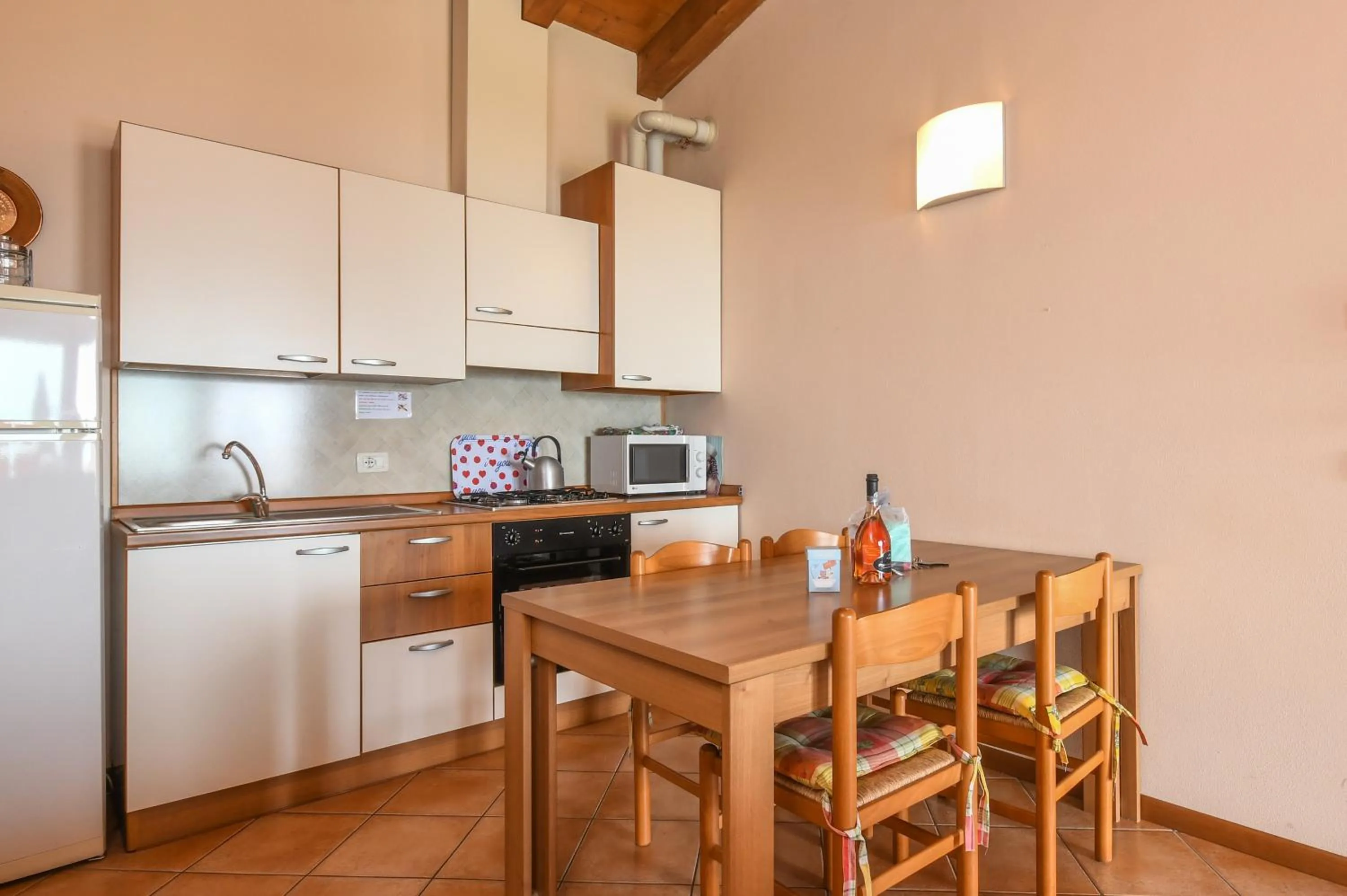 Kitchen or kitchenette in Residence Corte Ferrari -Ciao Vacanze-