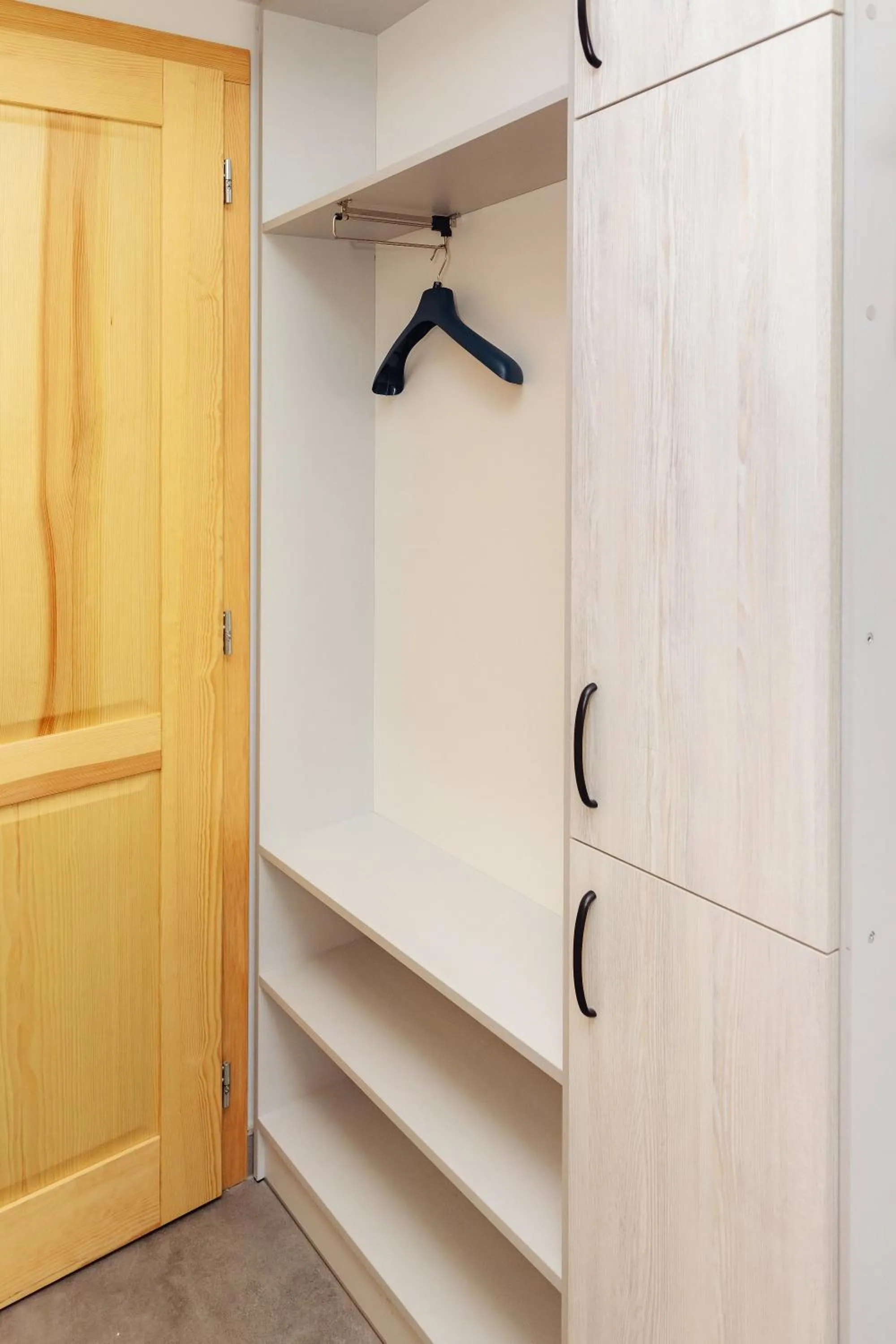 wardrobe in Arcus Premium Hostel