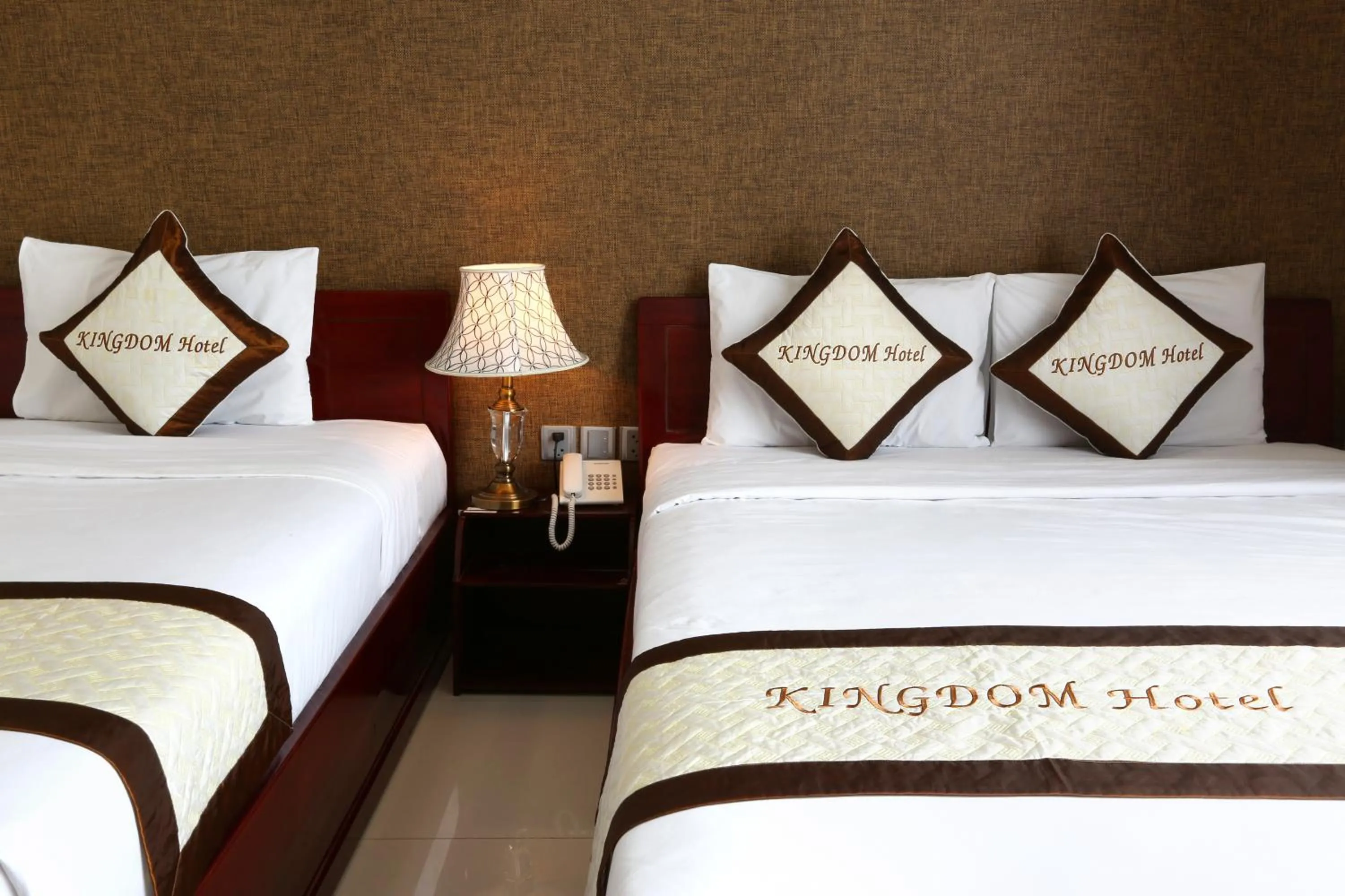 Bed in Kingdom Danang Hotel