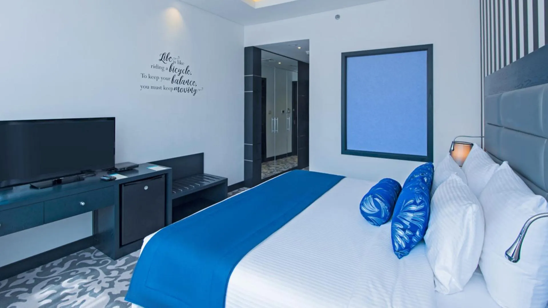 Bed in Signature 1 Hotel Tecom