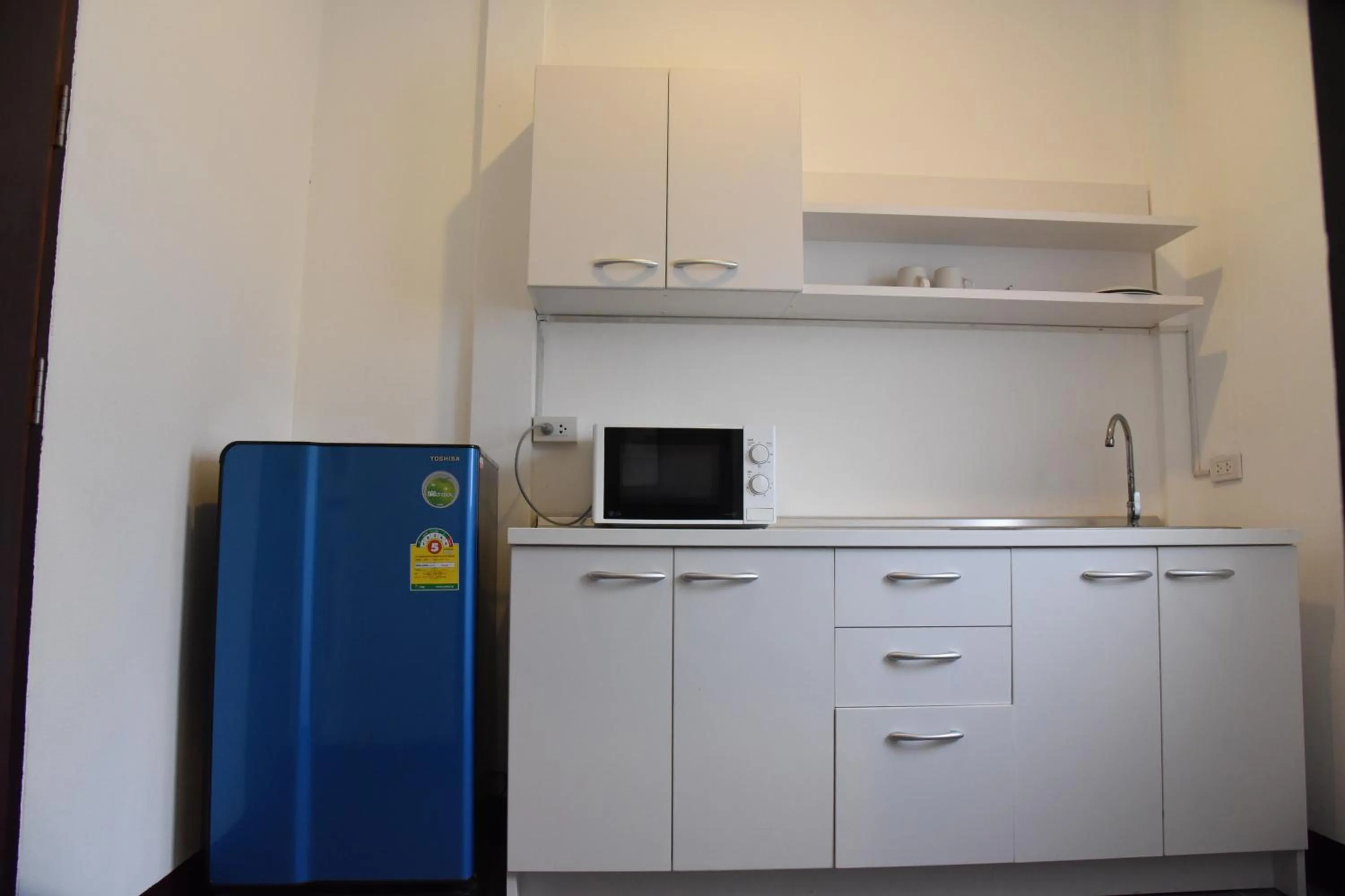 Kitchen or kitchenette in Fairtex Residence Pattaya