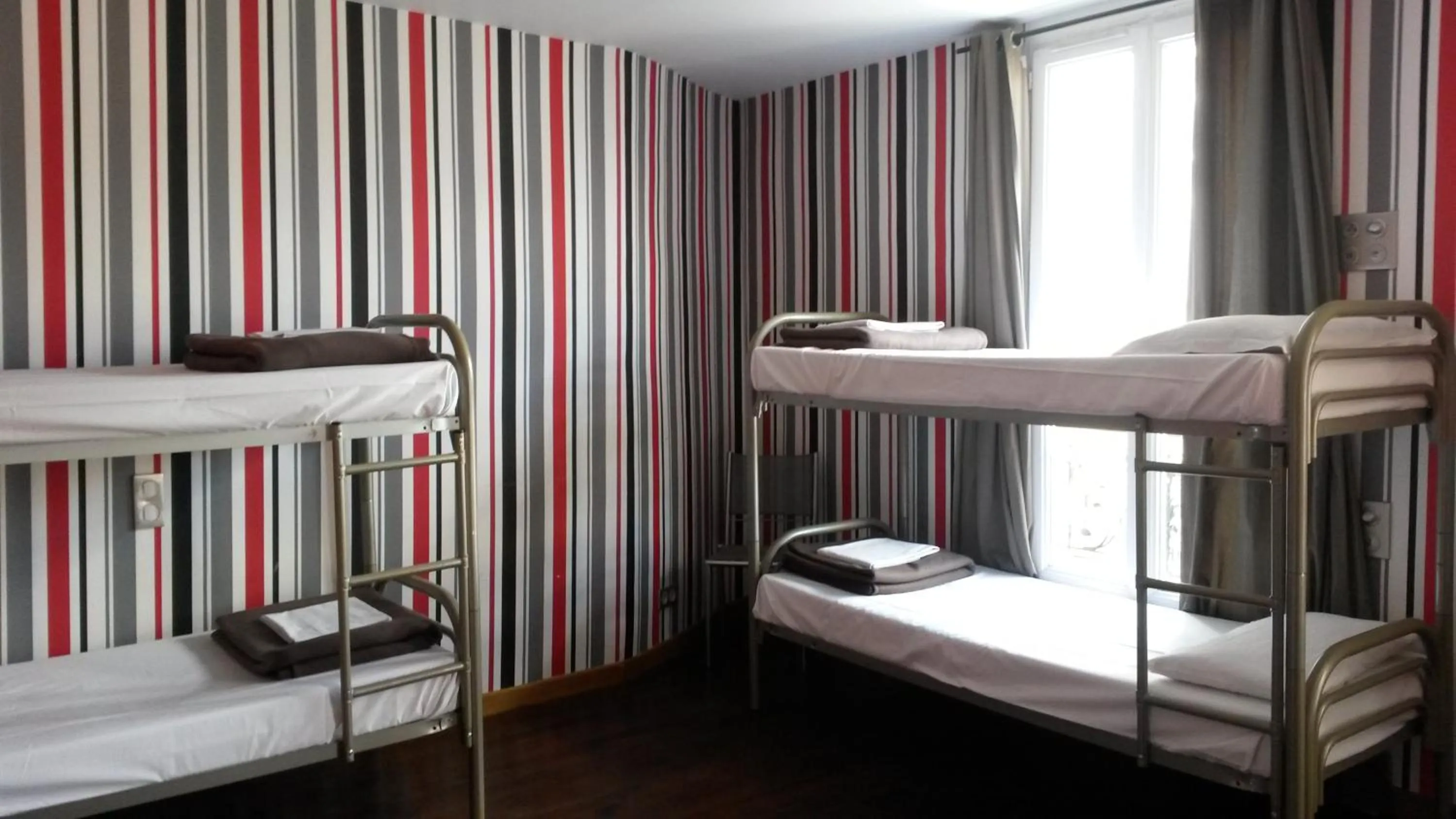 Bed in Oops! Latin quarter by Hiphophostels