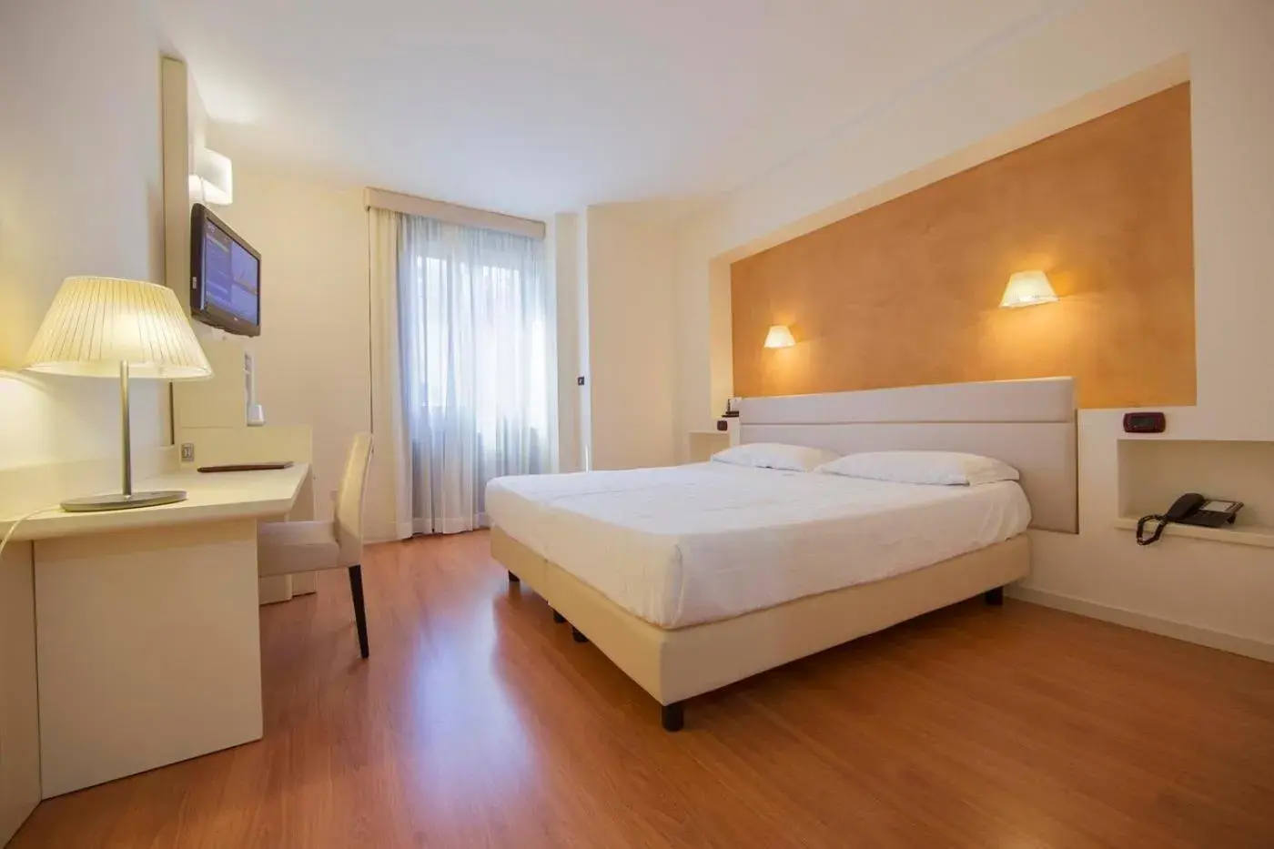 Bed in Hotel Orientale Bed in Hotel Orientale