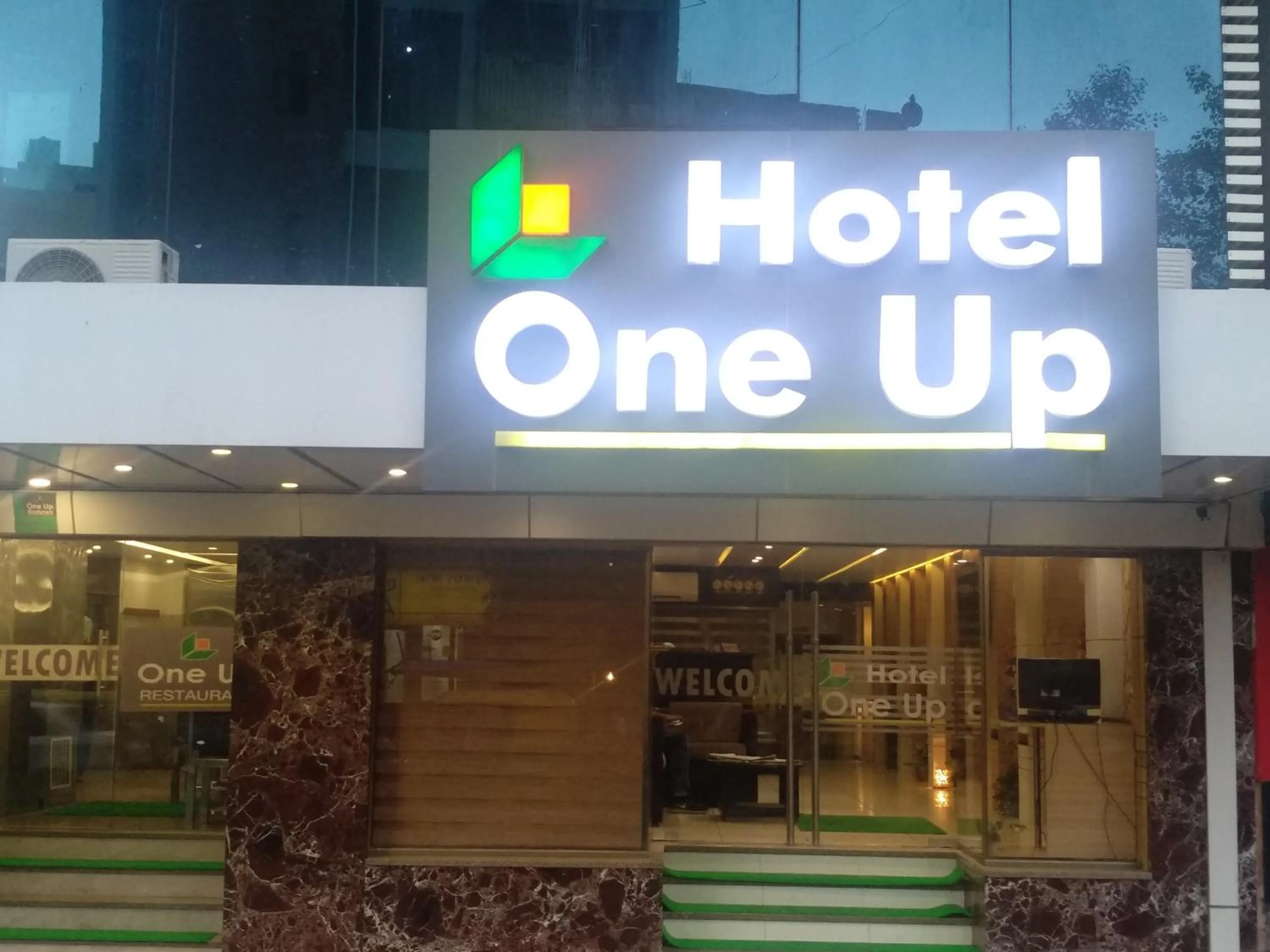 Property logo or sign in Hotel One Up