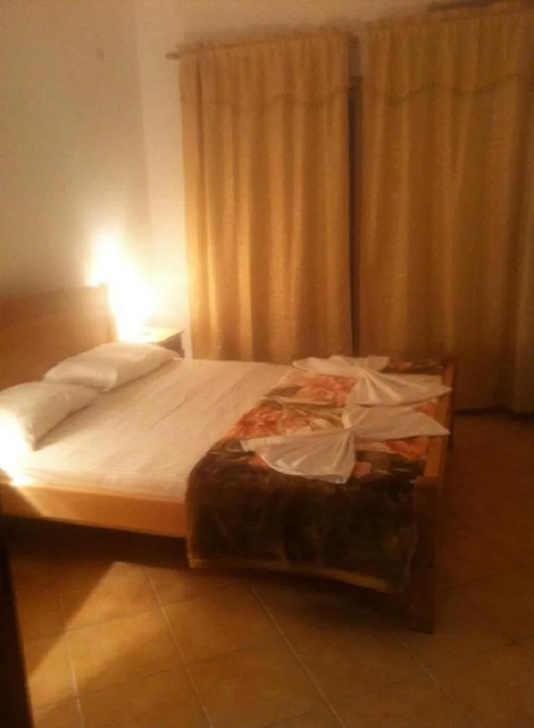 Photo of the whole room, Bed in Sand and Sea Apartments