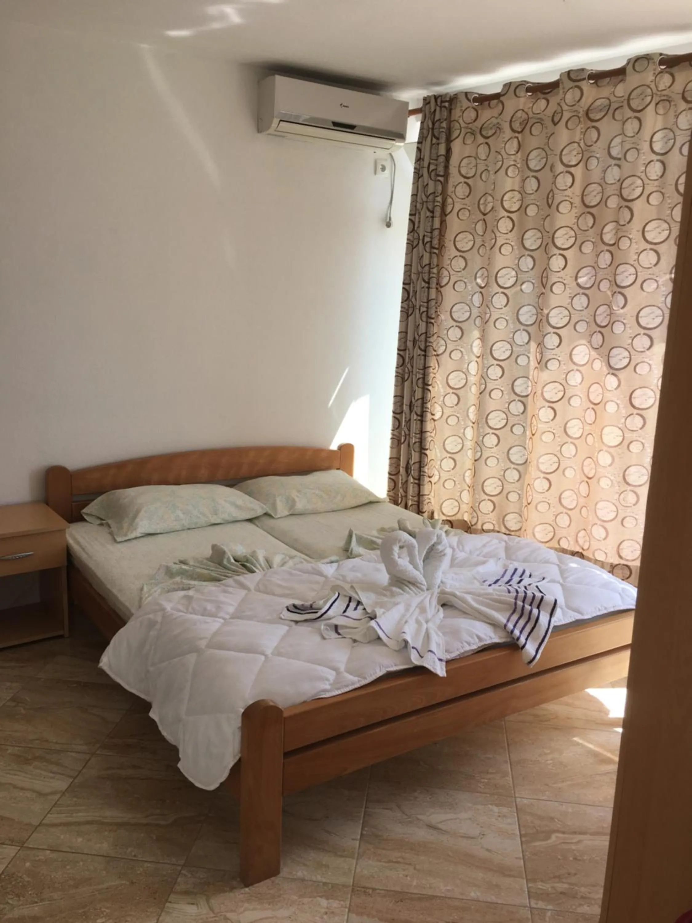 Photo of the whole room, Bed in Sand and Sea Apartments