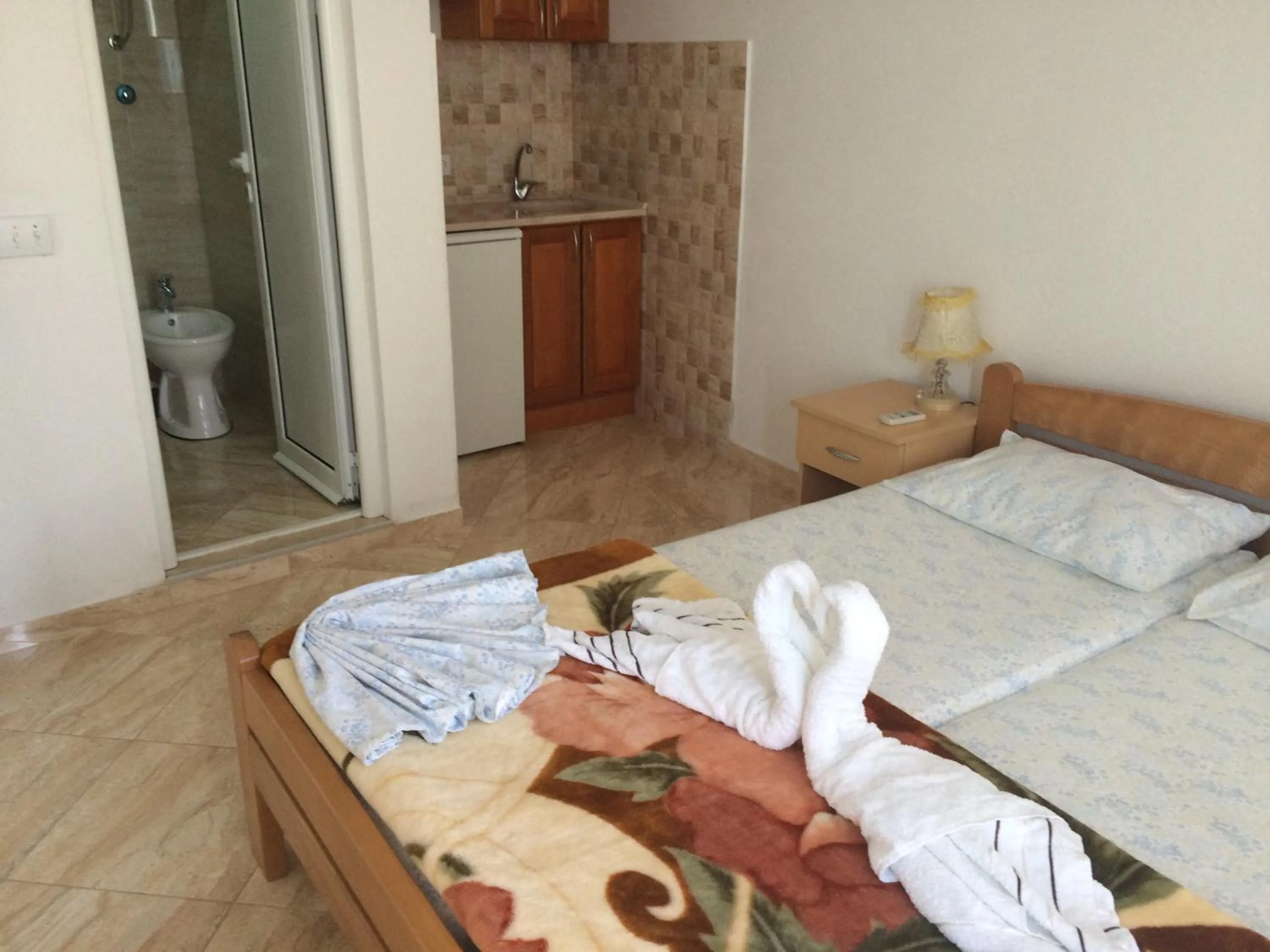 Photo of the whole room, Bed in Sand and Sea Apartments