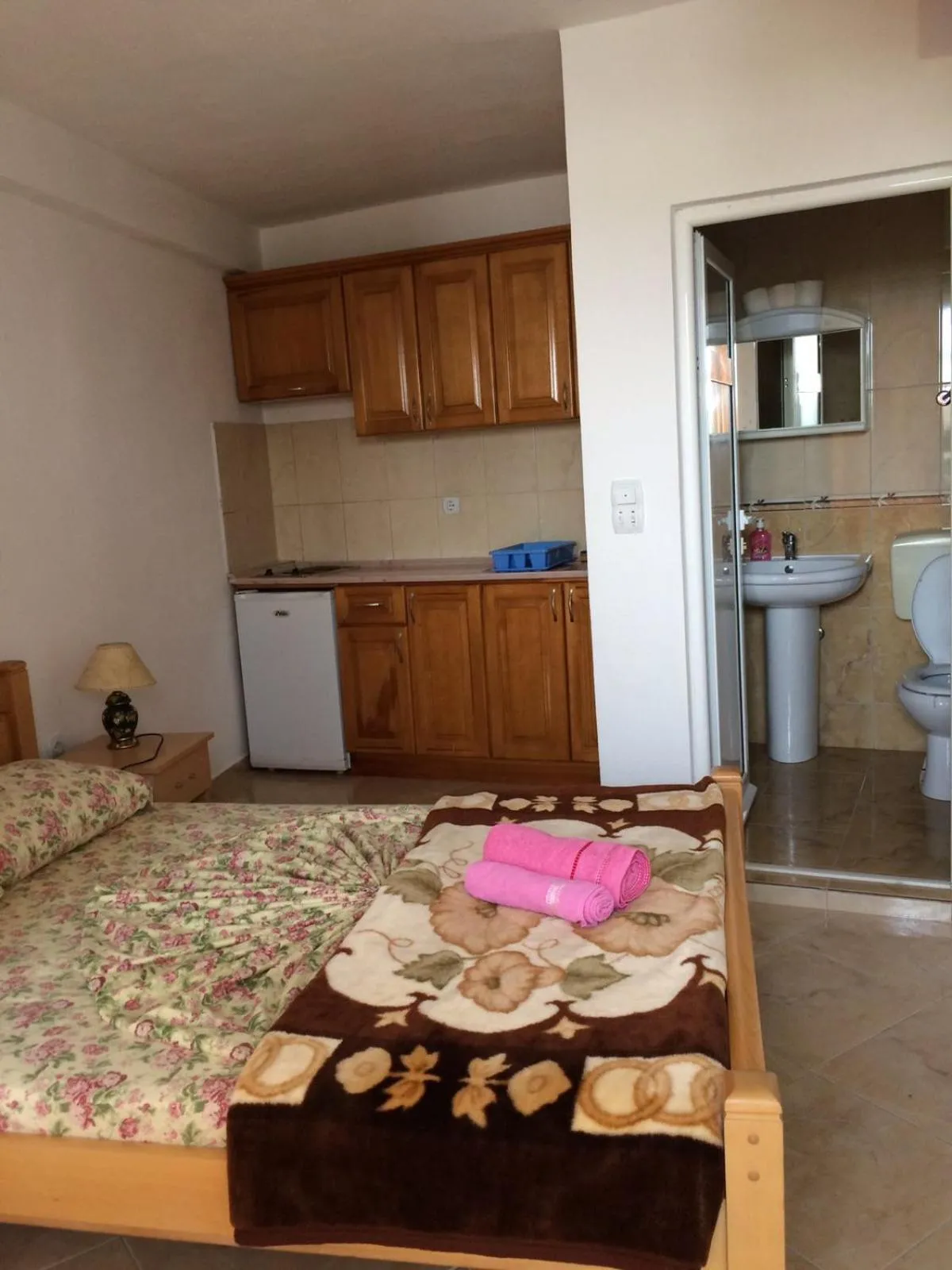 Kitchen or kitchenette, Bed in Sand and Sea Apartments