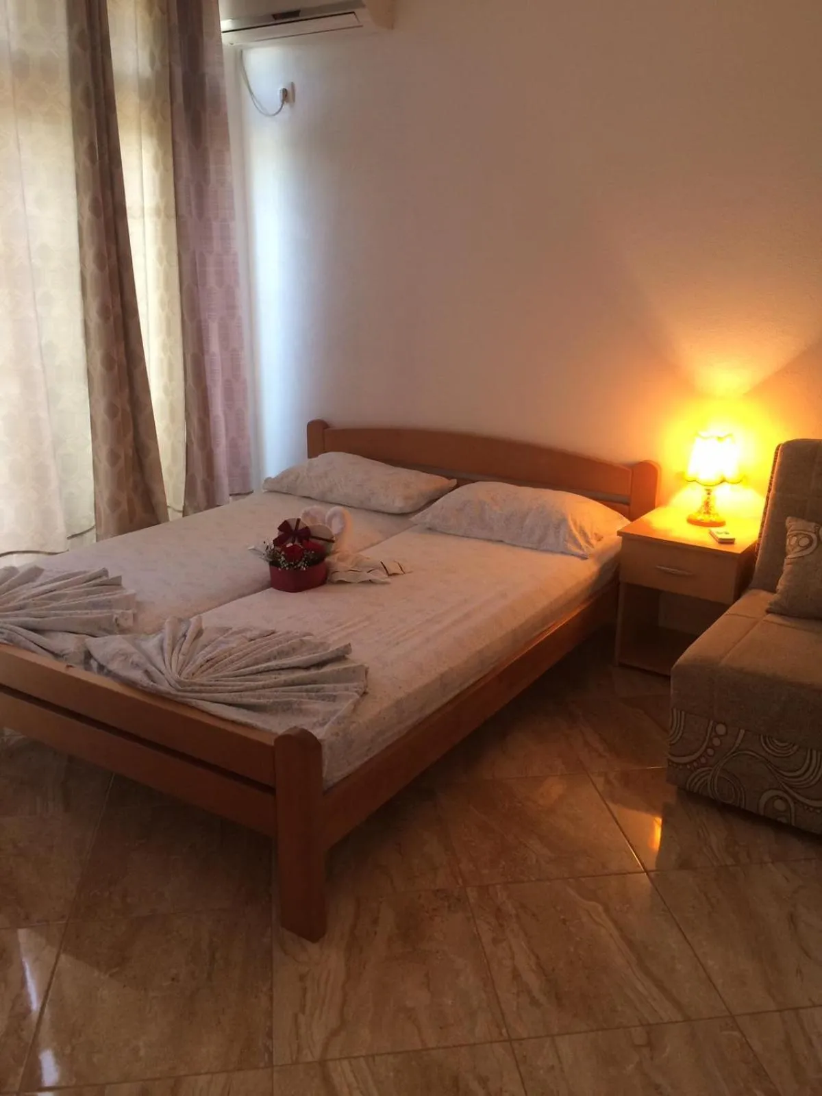 Photo of the whole room, Bed in Sand and Sea Apartments
