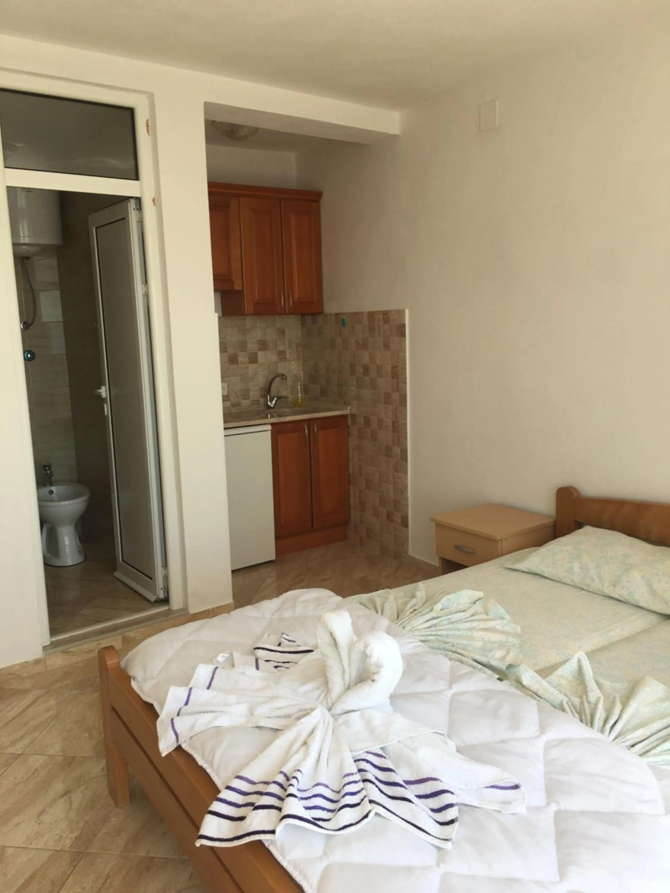 Photo of the whole room, Bed in Sand and Sea Apartments
