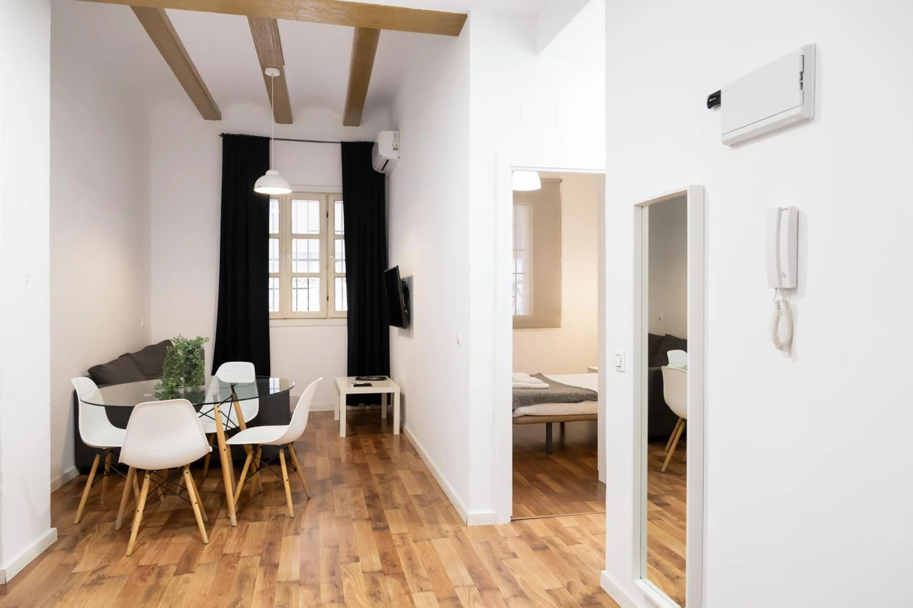 Photo of the whole room, Bed in Down Town