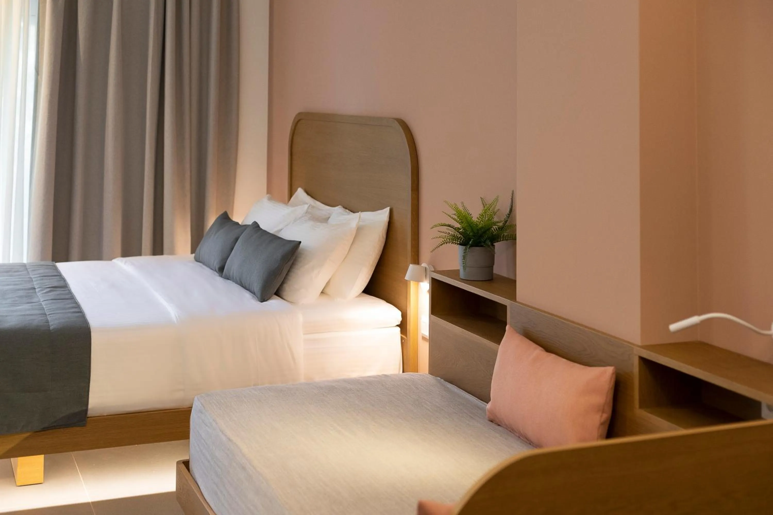 Bed in Mandraki Village Boutique Hotel