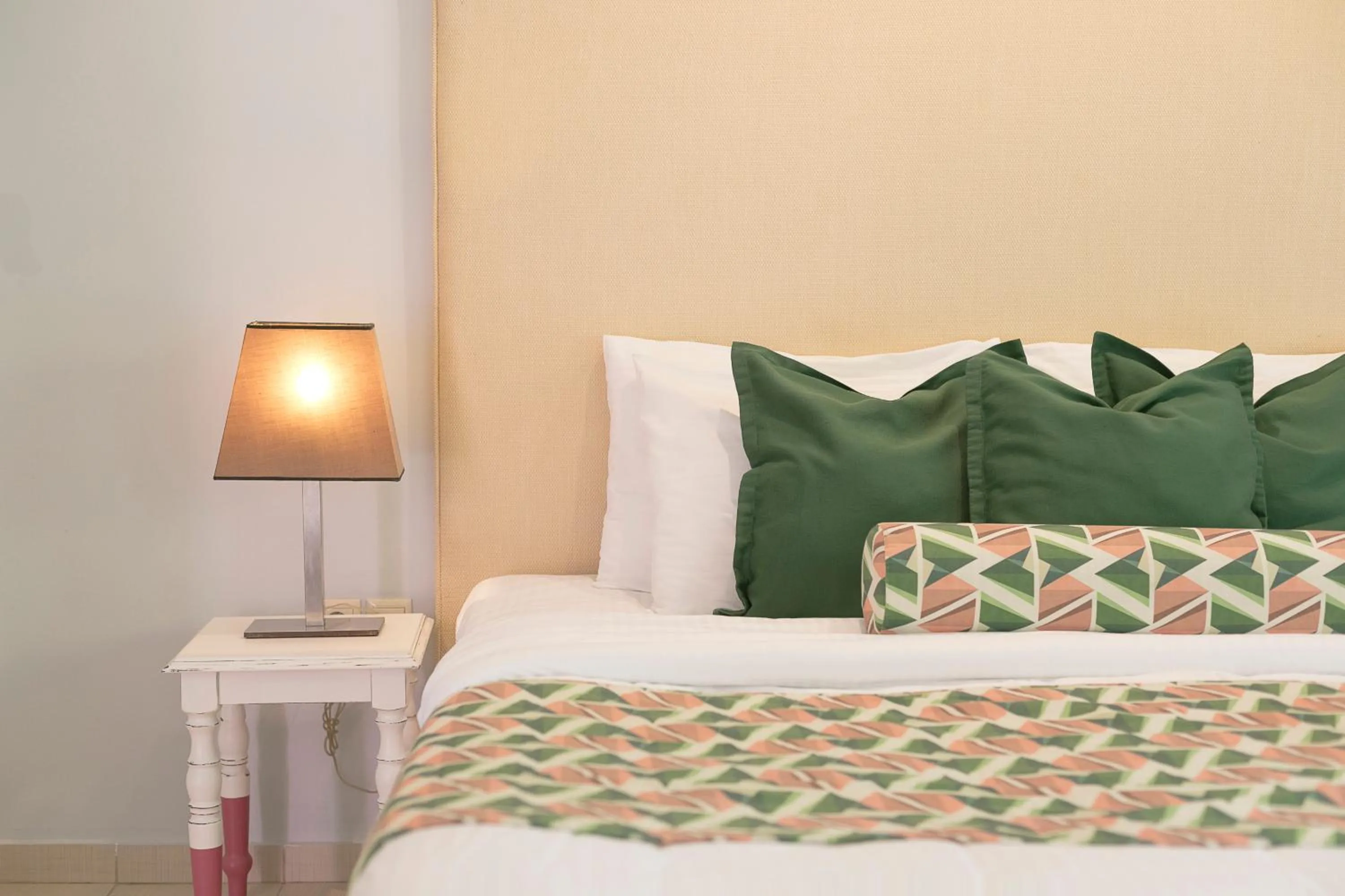 Bed in Mandraki Village Boutique Hotel