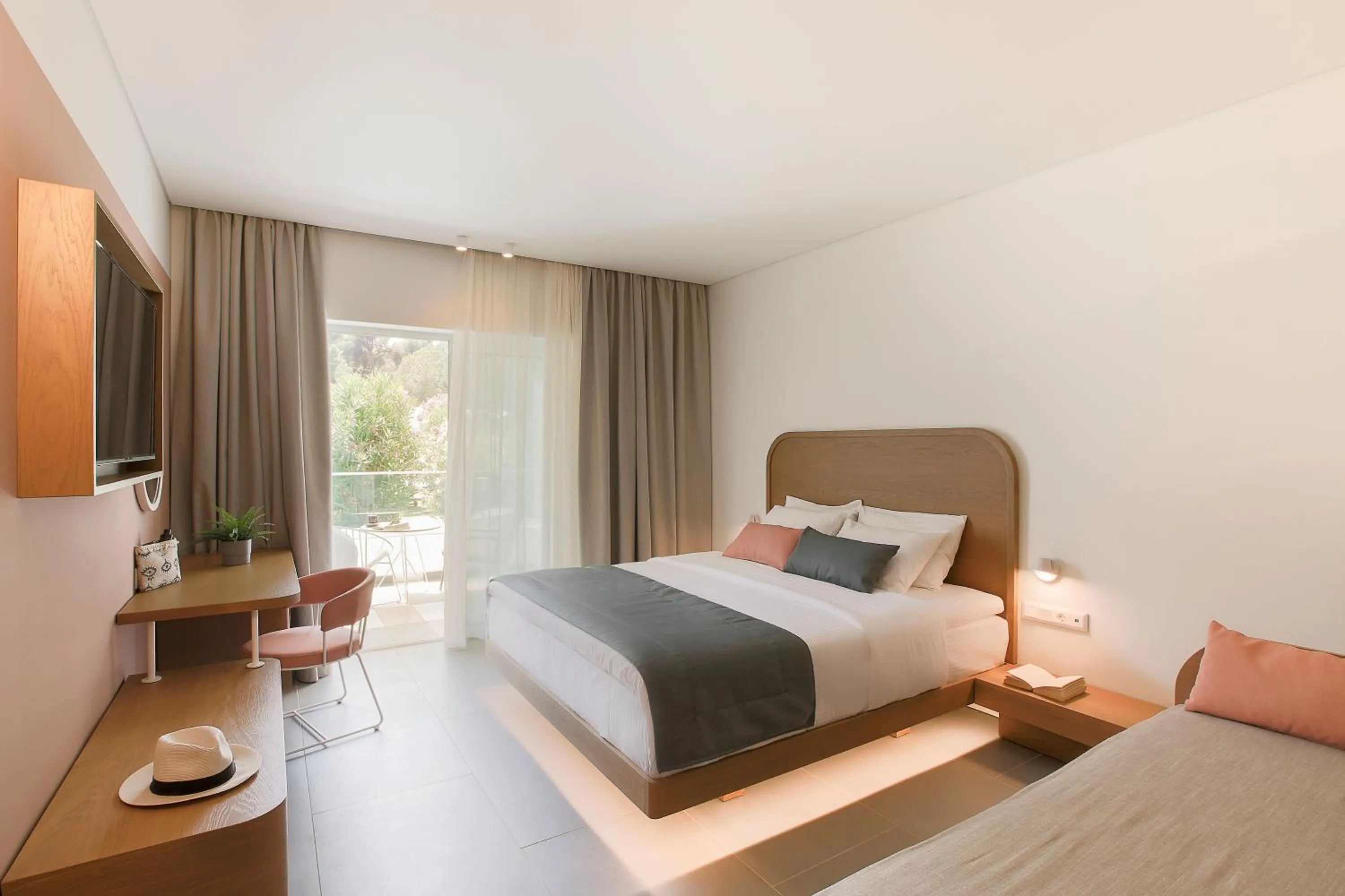 Bed in Mandraki Village Boutique Hotel