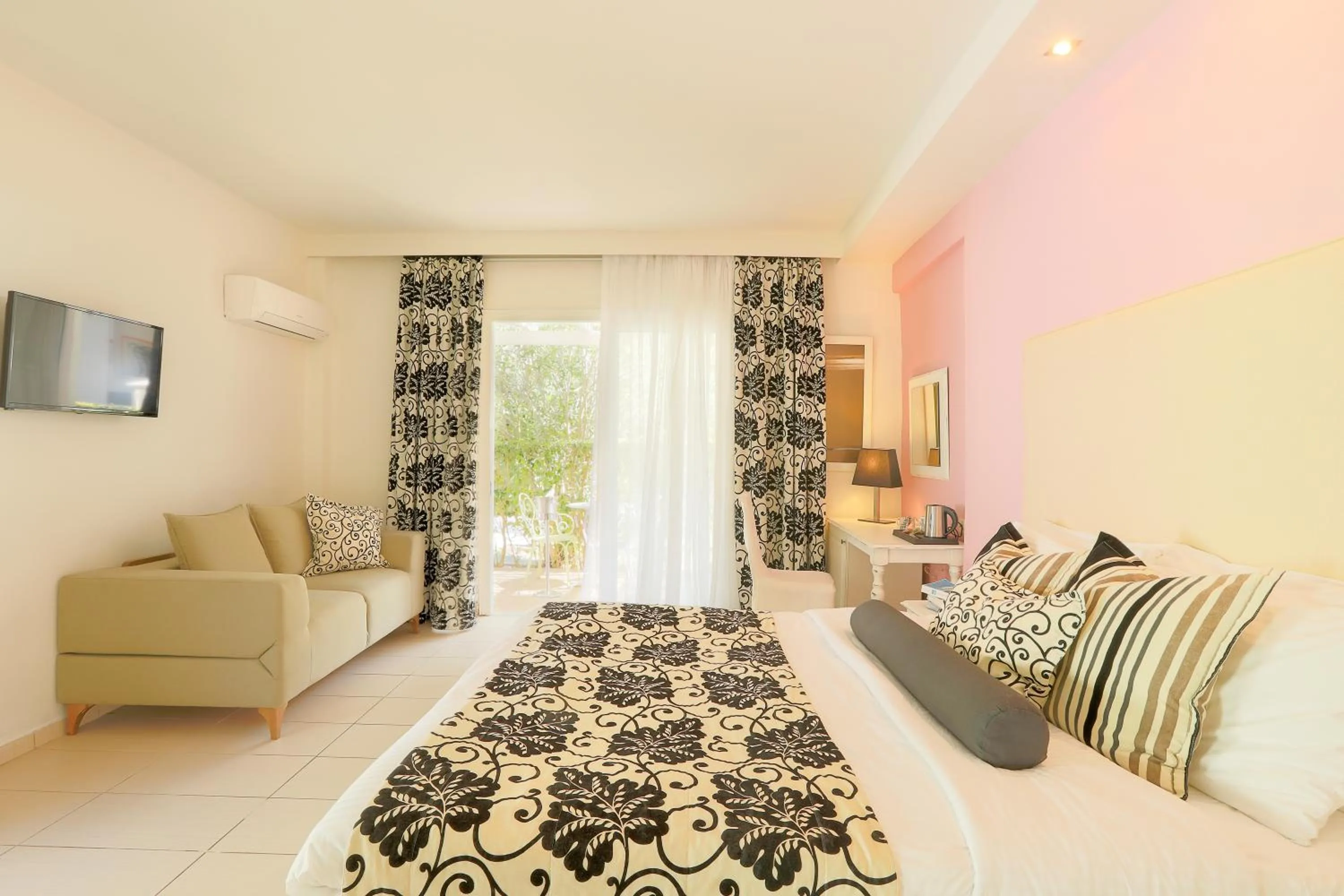 Photo of the whole room, Bed in Mandraki Village Boutique Hotel