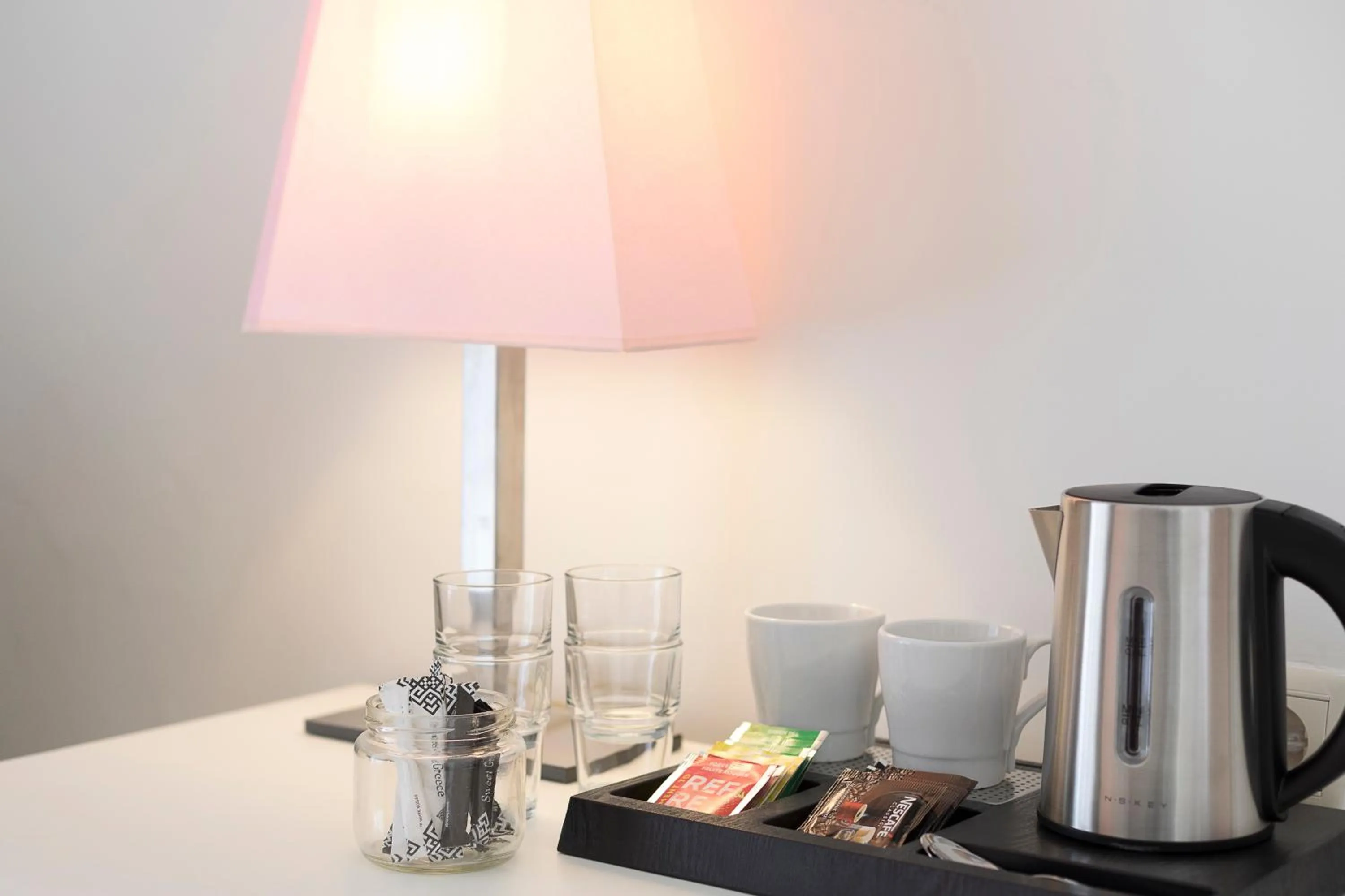 Bedroom in Mandraki Village Boutique Hotel