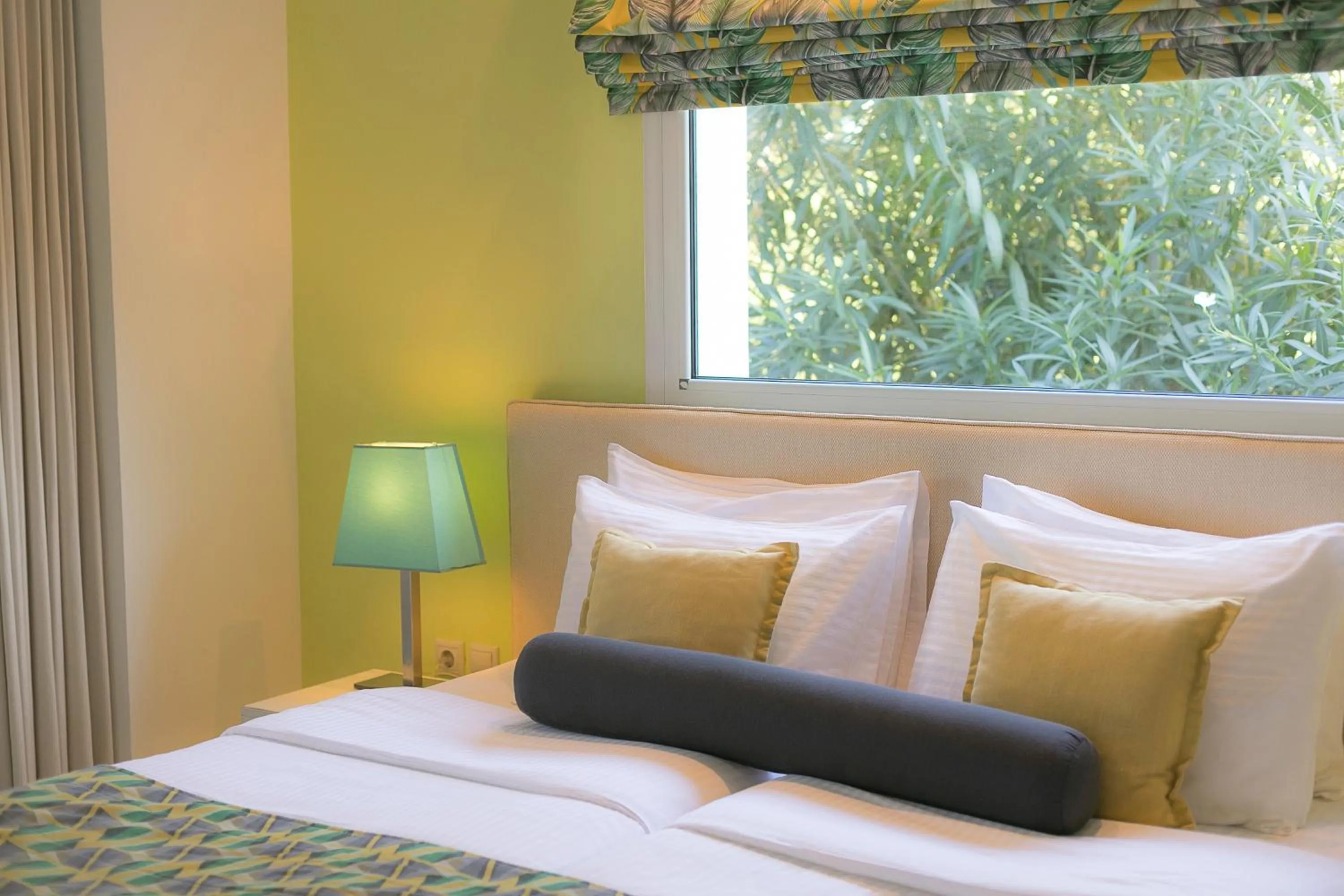 Bed in Mandraki Village Boutique Hotel