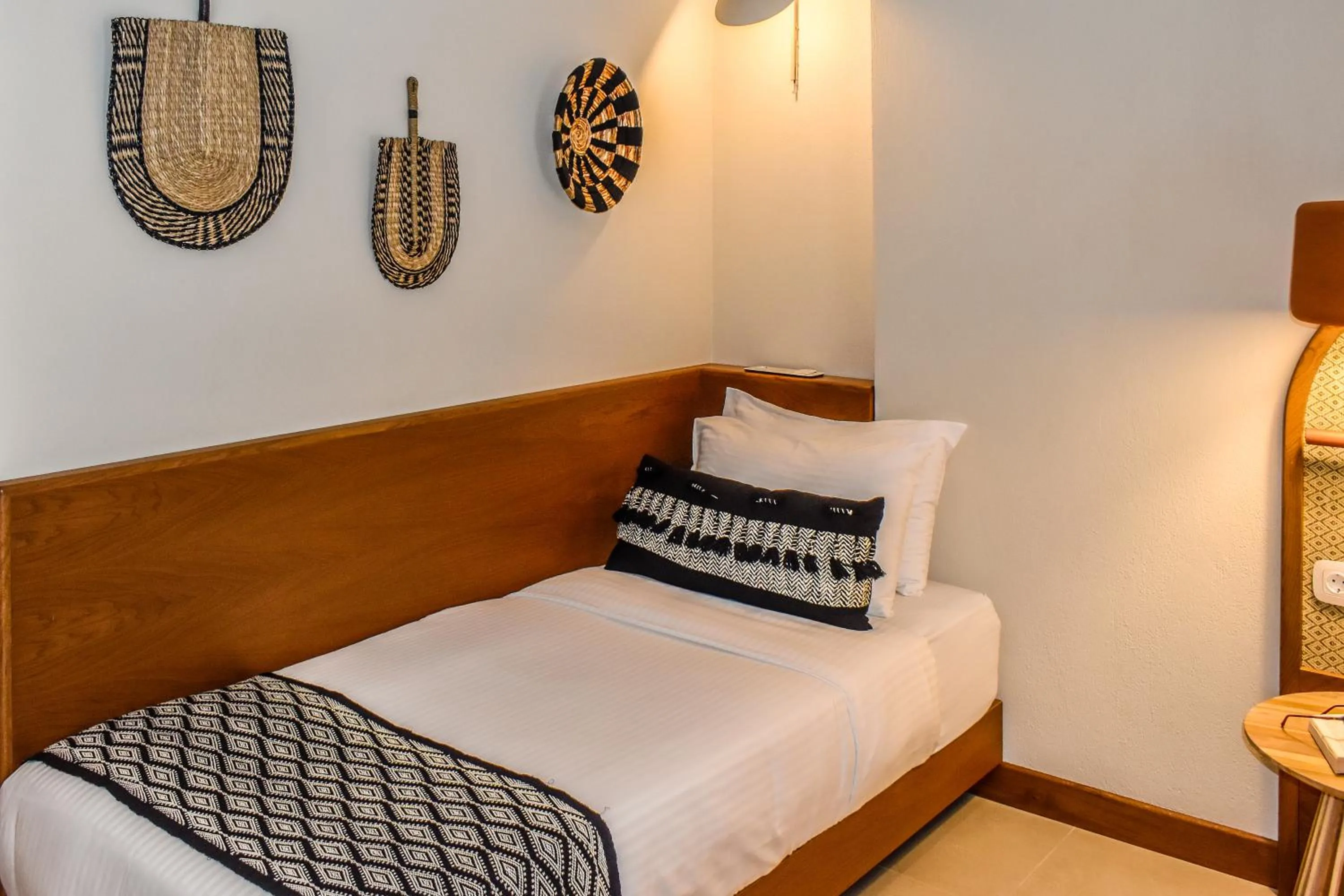 Bed in Mandraki Village Boutique Hotel