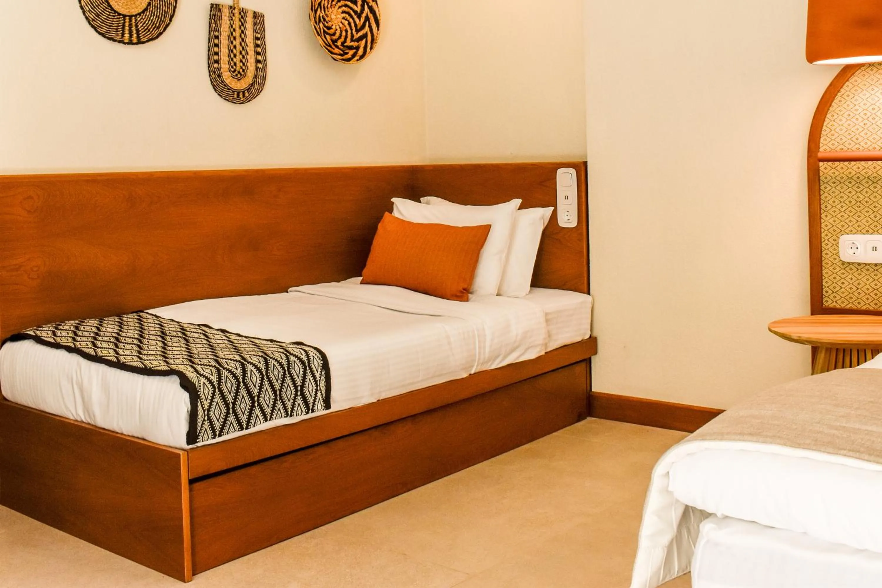 Bed in Mandraki Village Boutique Hotel
