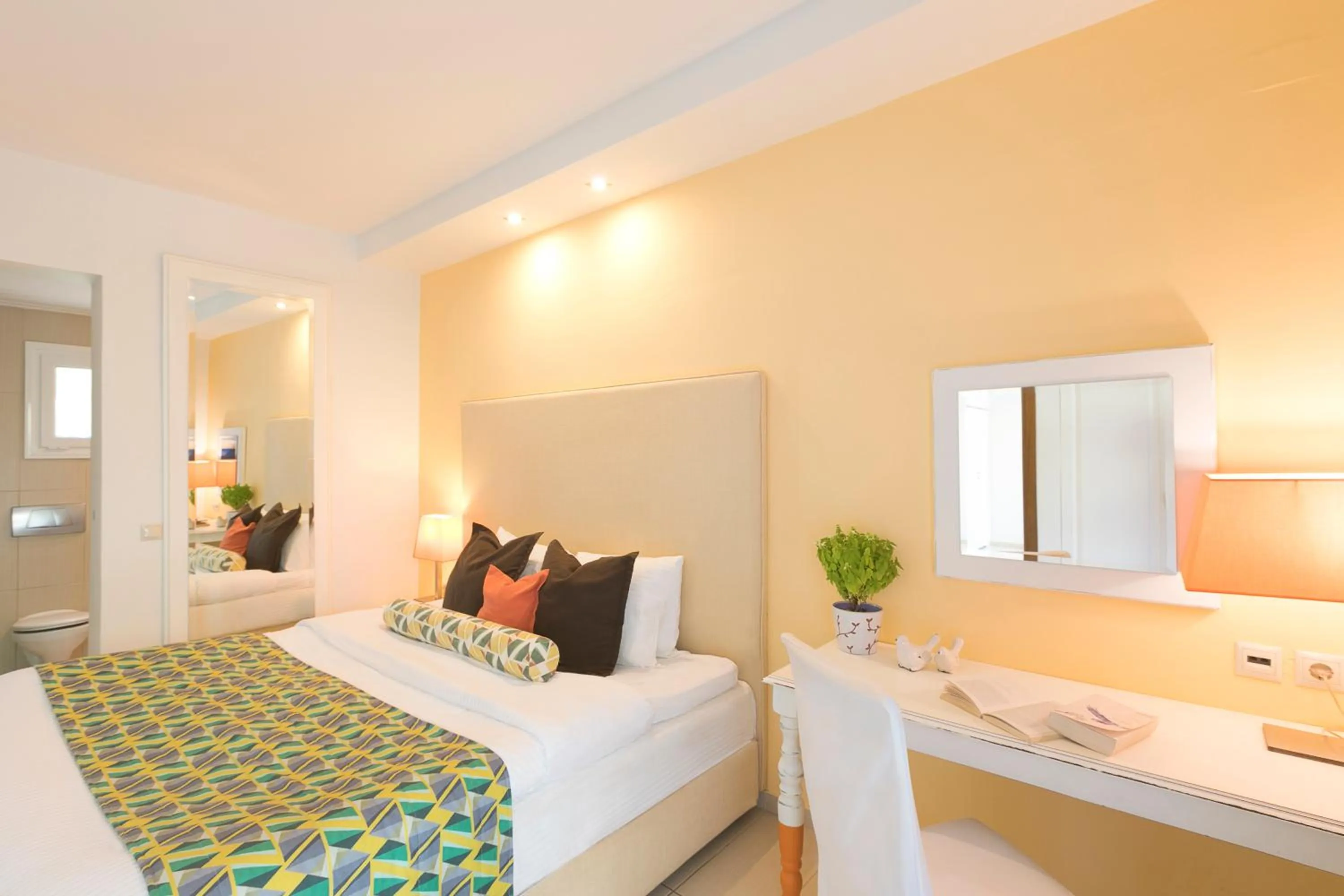 Bed in Mandraki Village Boutique Hotel