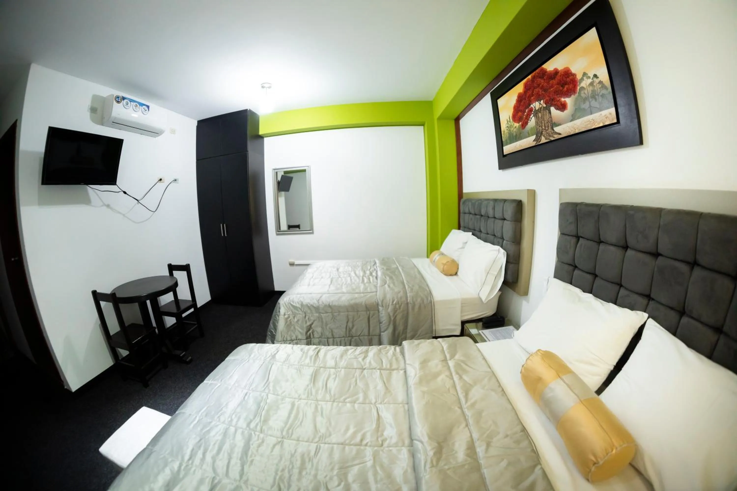 Bed in Costa Del Inka Hotel