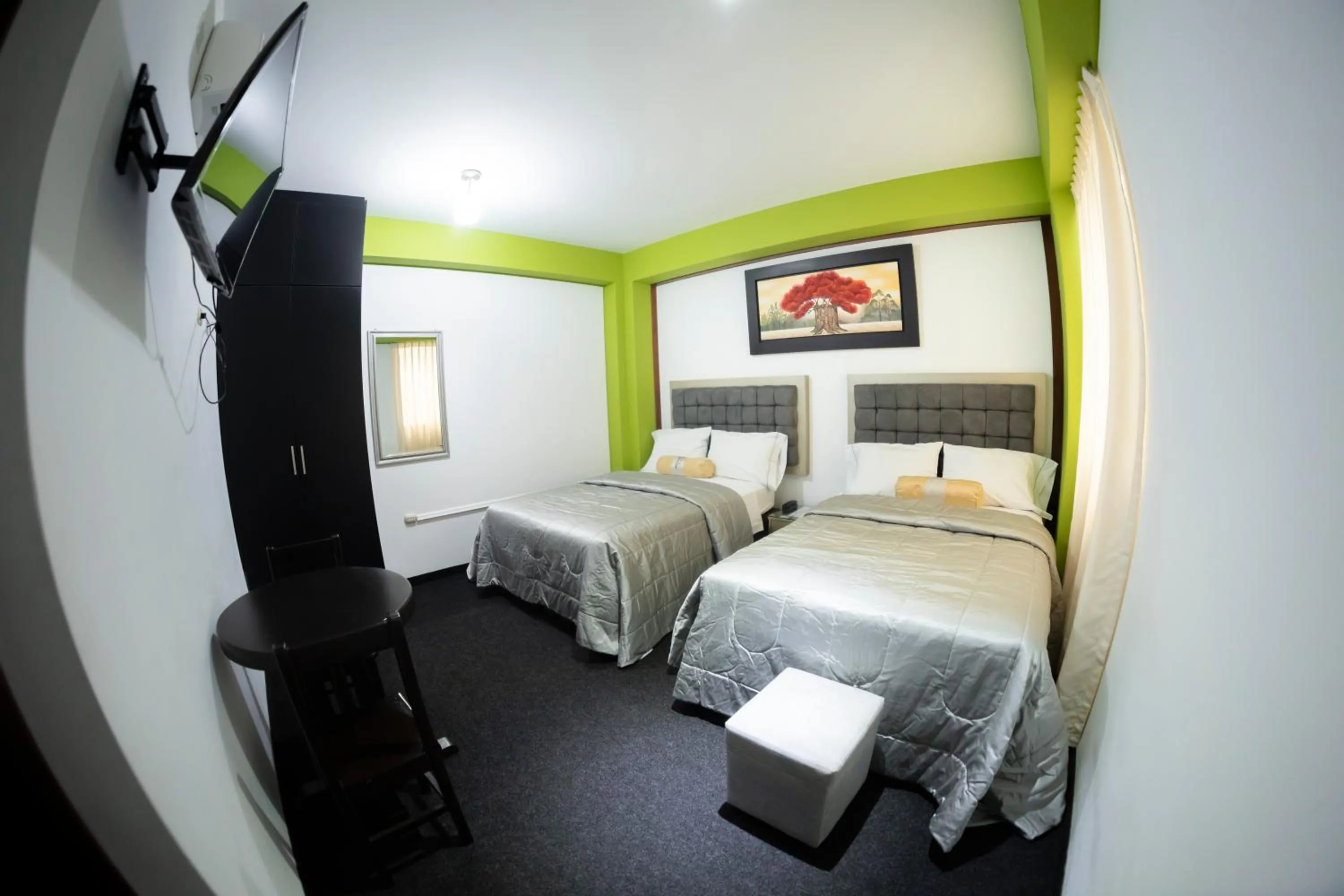 Bed in Costa Del Inka Hotel