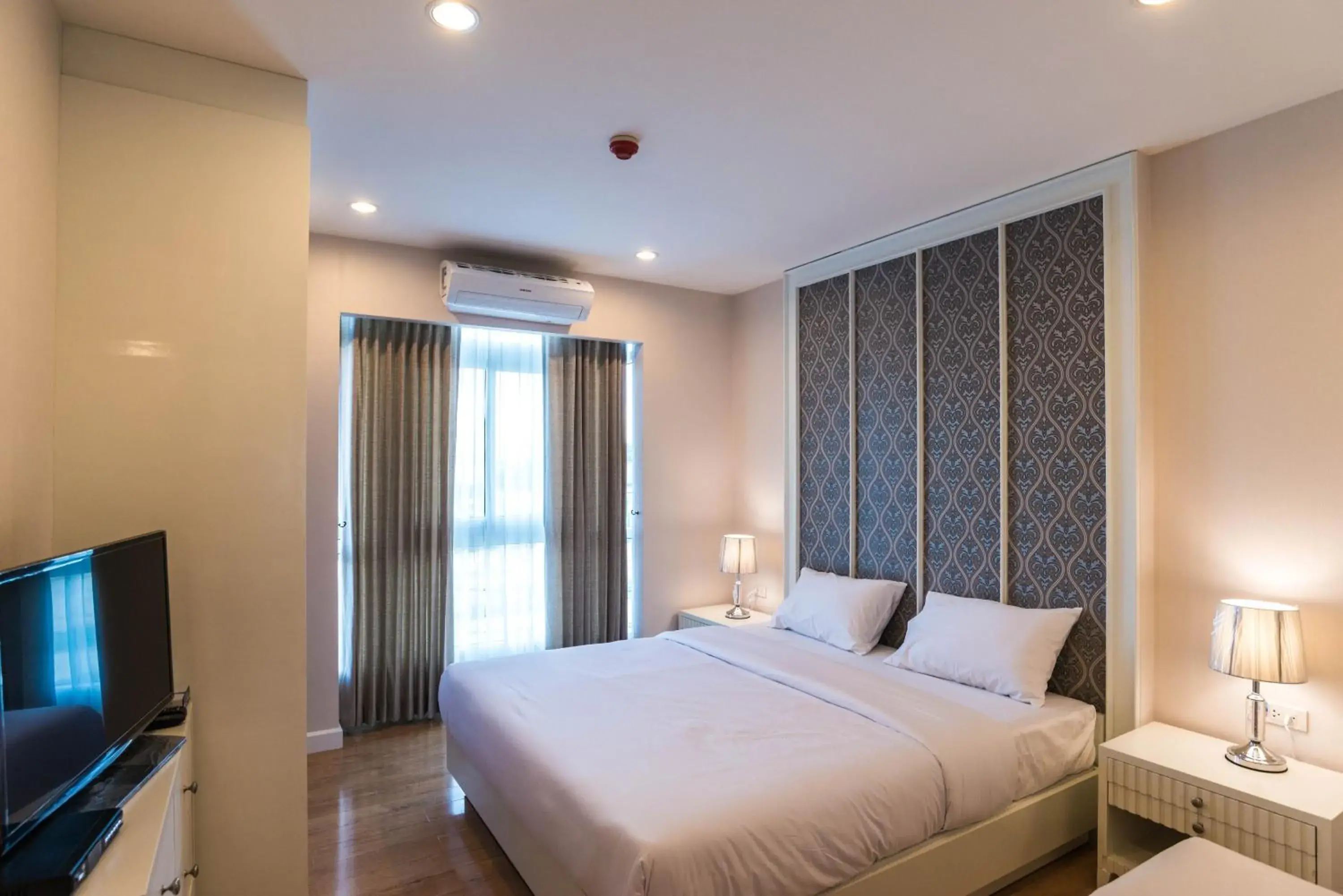 Bedroom, Bed in Harmony Resort Hotel Bedroom, Bed in Harmony Resort Hotel