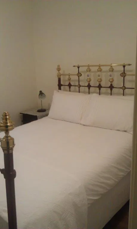 Bed in Annies Garden Cottage