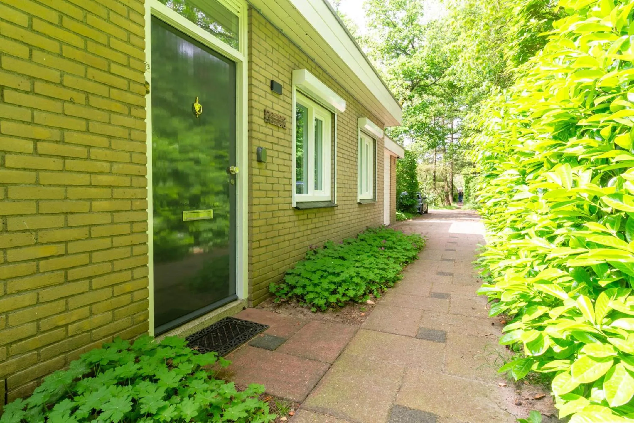 Facade/entrance in Holiday Home Eekhoornbosch