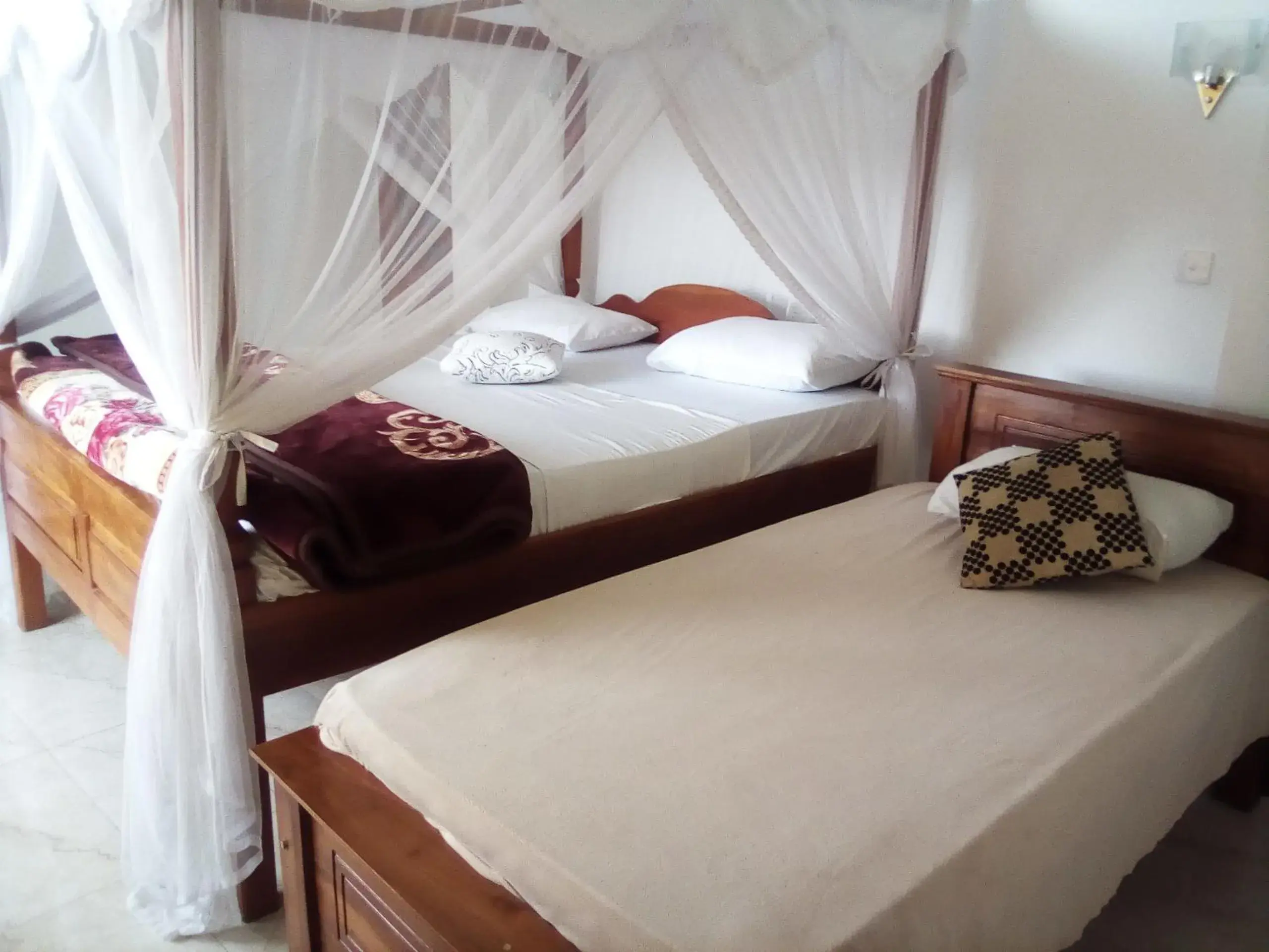 Triple Room with Balcony in Lilly Guest Inn Triple Room with Balcony in Lilly Guest Inn
