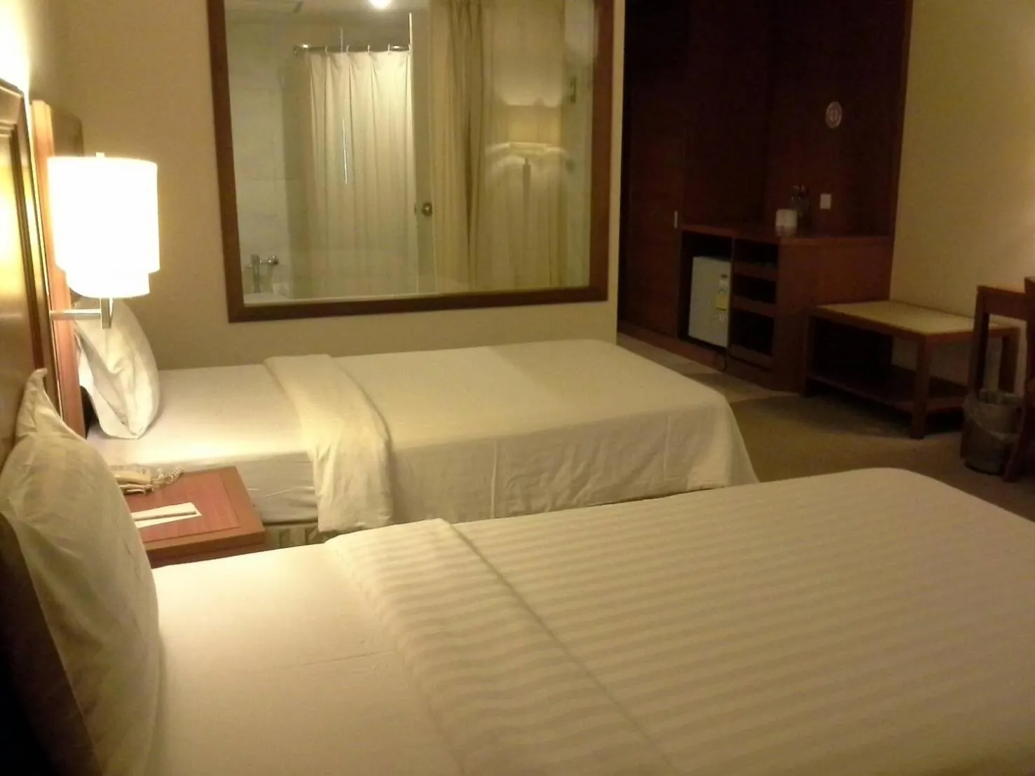 Bed in Grand Mandarin Betong Hotel