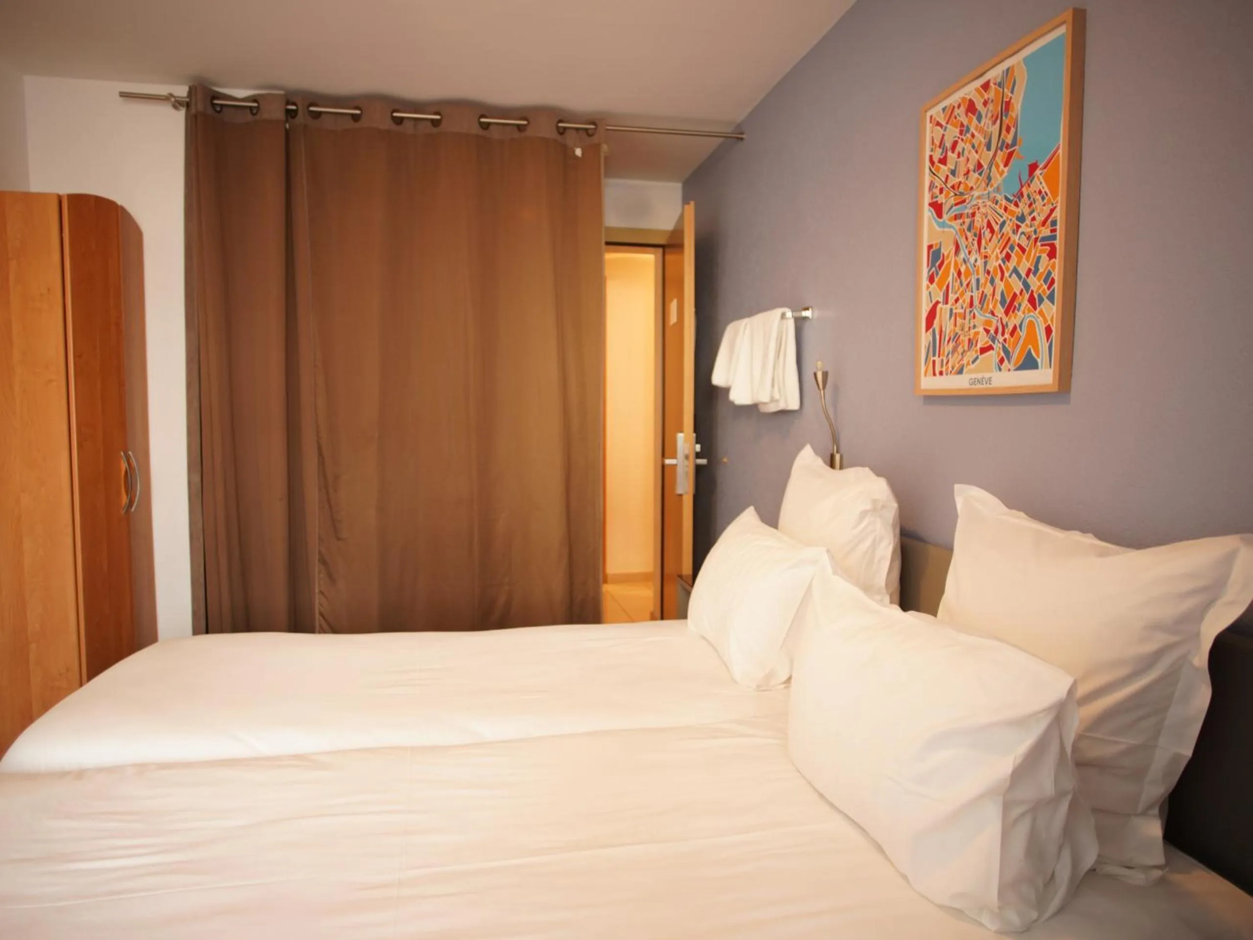 Bed in Primadom Aparthotel