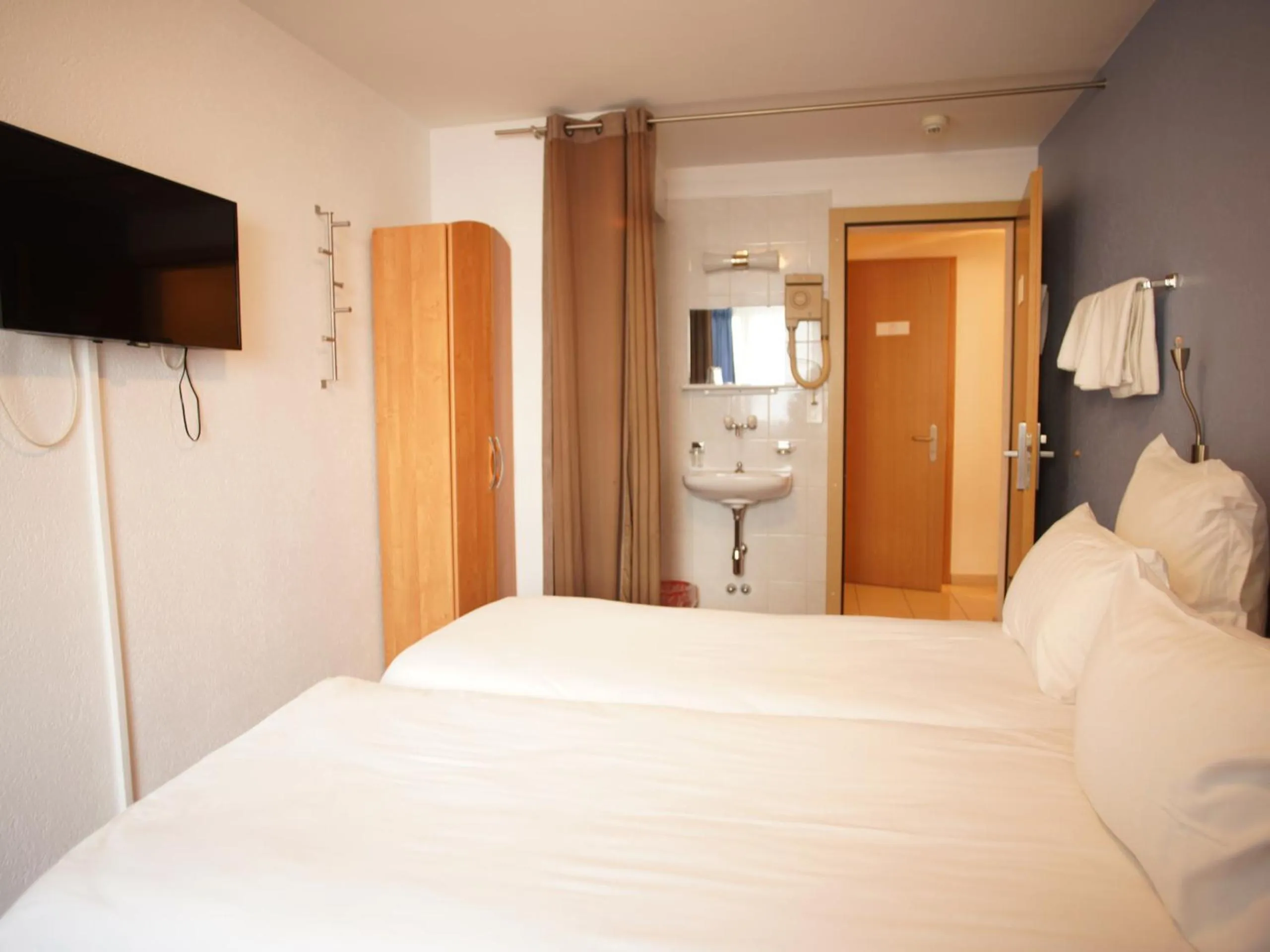 Bed in Primadom Aparthotel