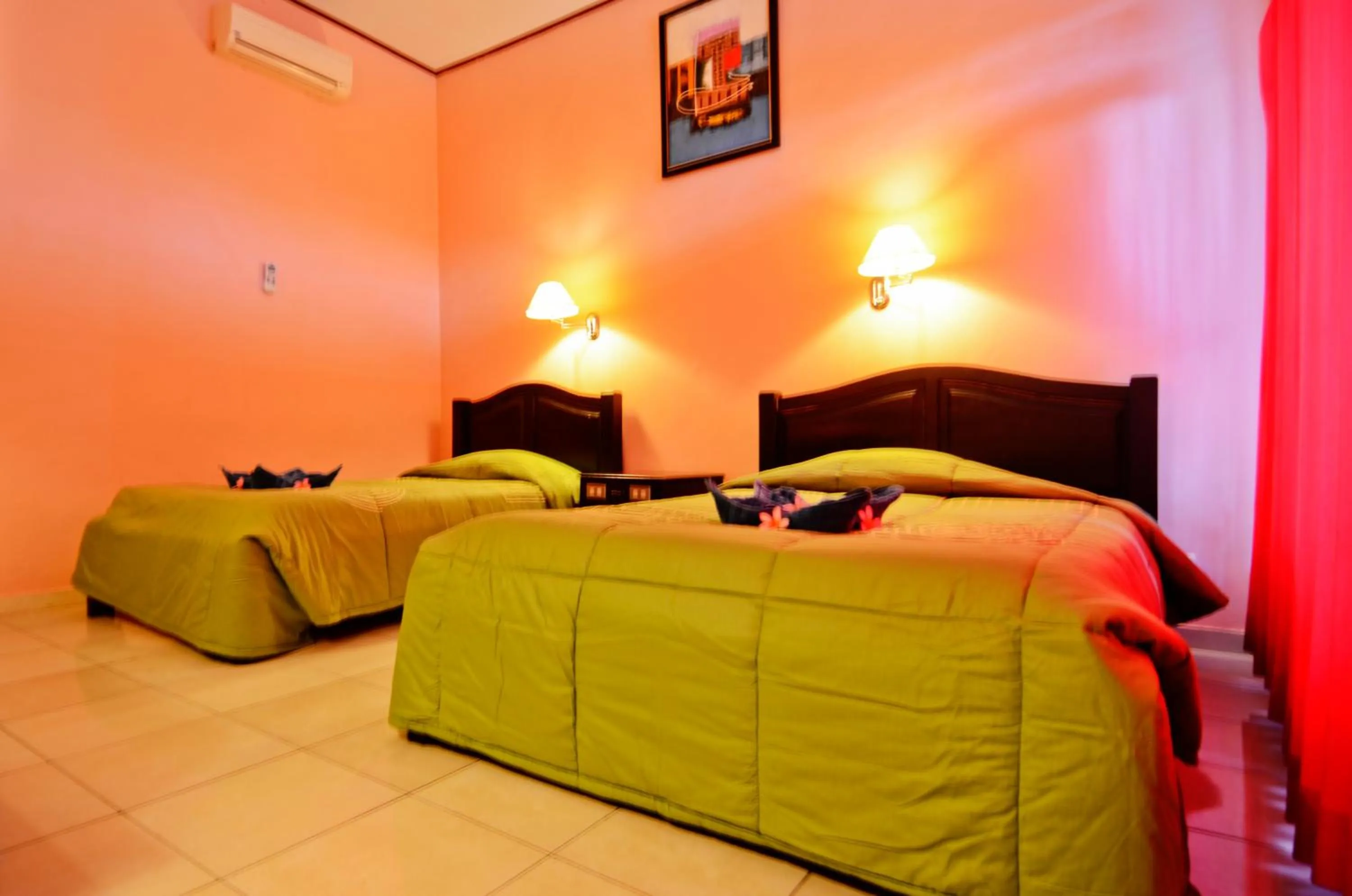 Bedroom, Bed in Pesona Beach Inn