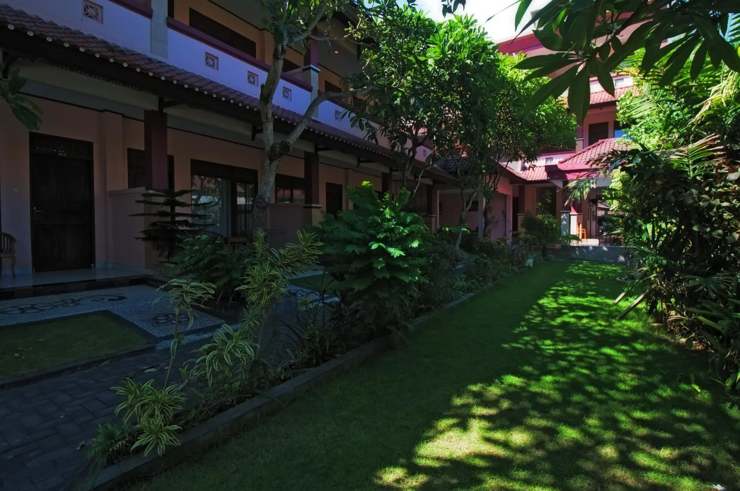 Garden view, Property Building in Pesona Beach Inn