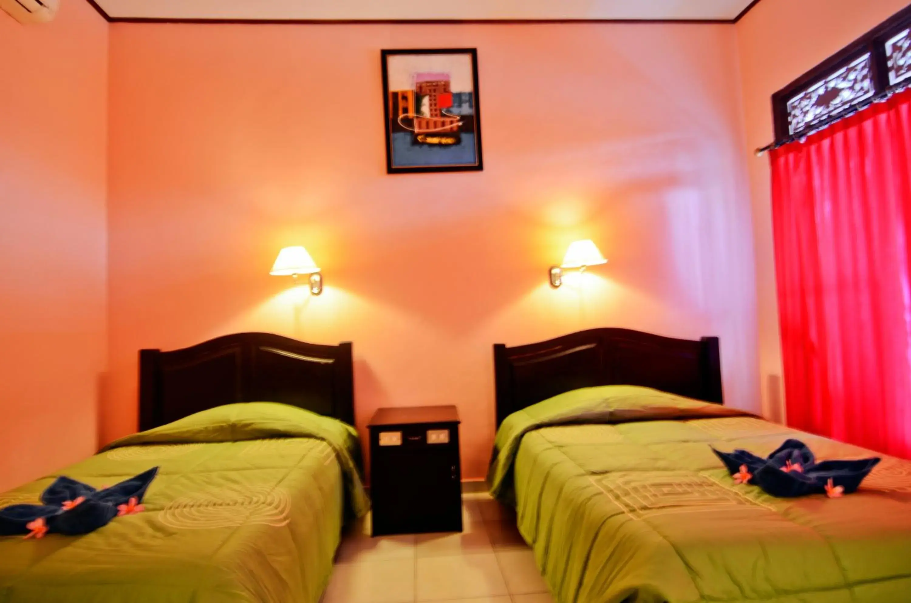 Bedroom, Bed in Pesona Beach Inn
