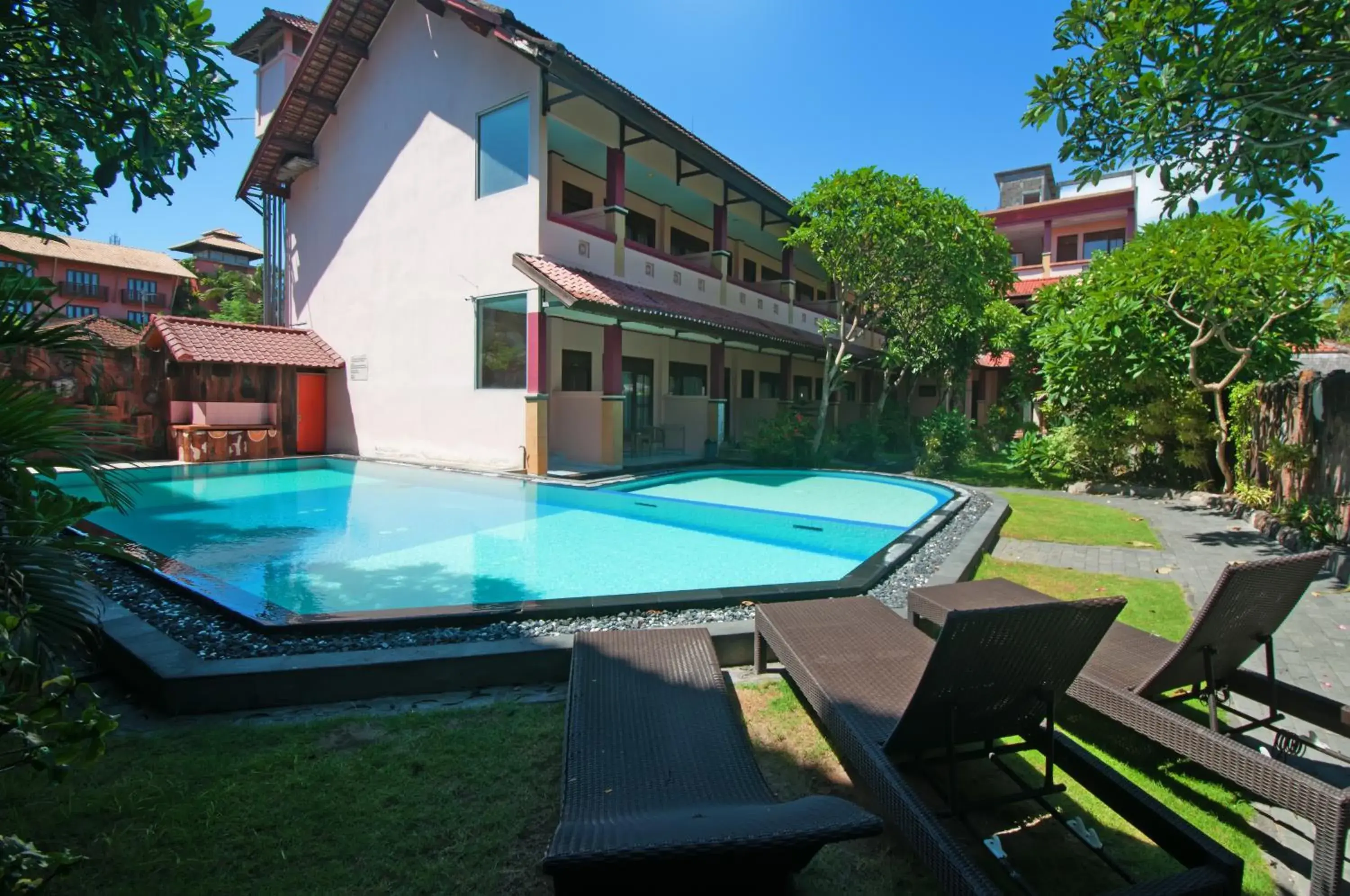 Swimming pool, Property Building in Pesona Beach Inn