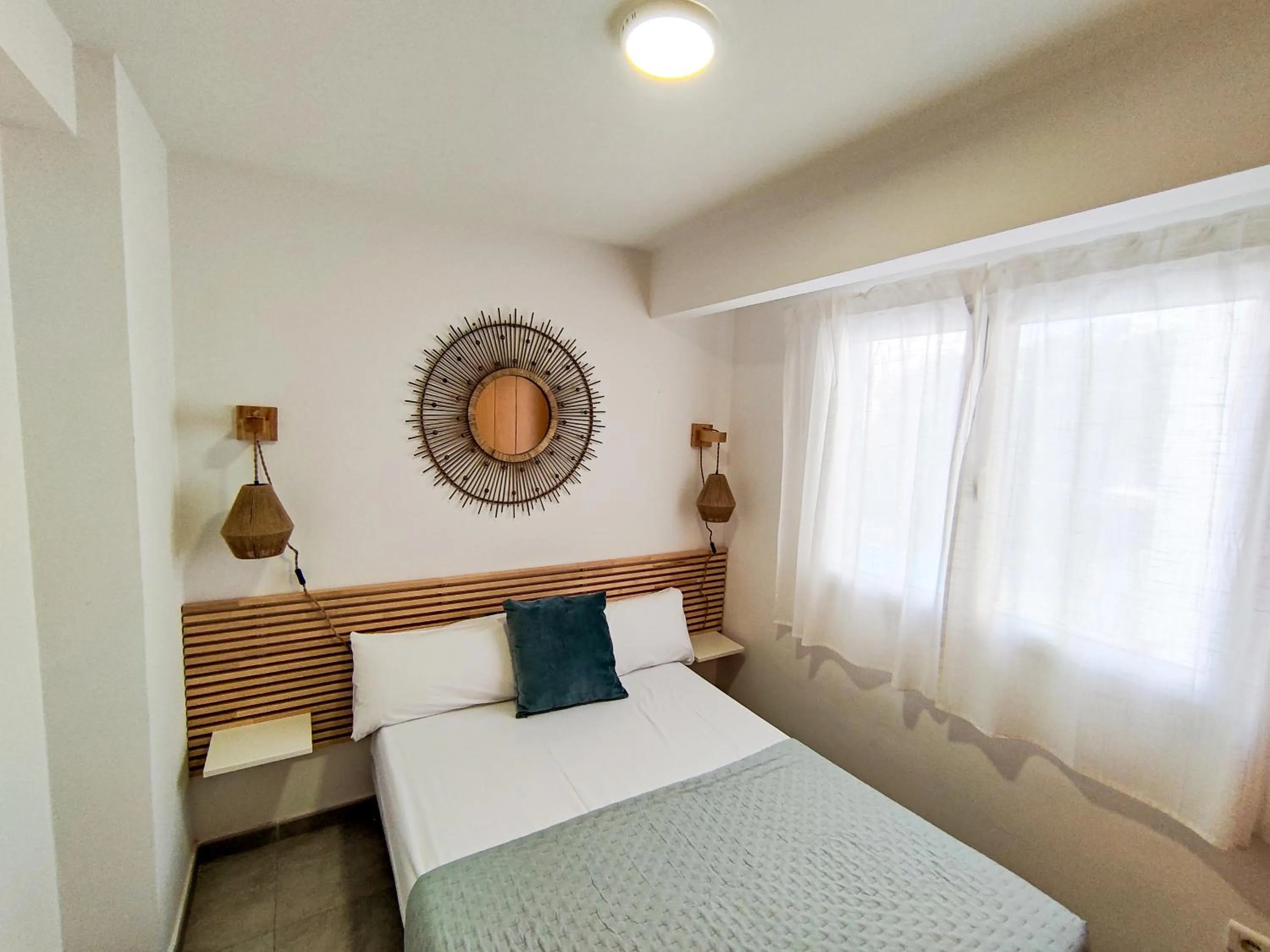 Bedroom, Bed in Apartamentos Gandía Centro 3000