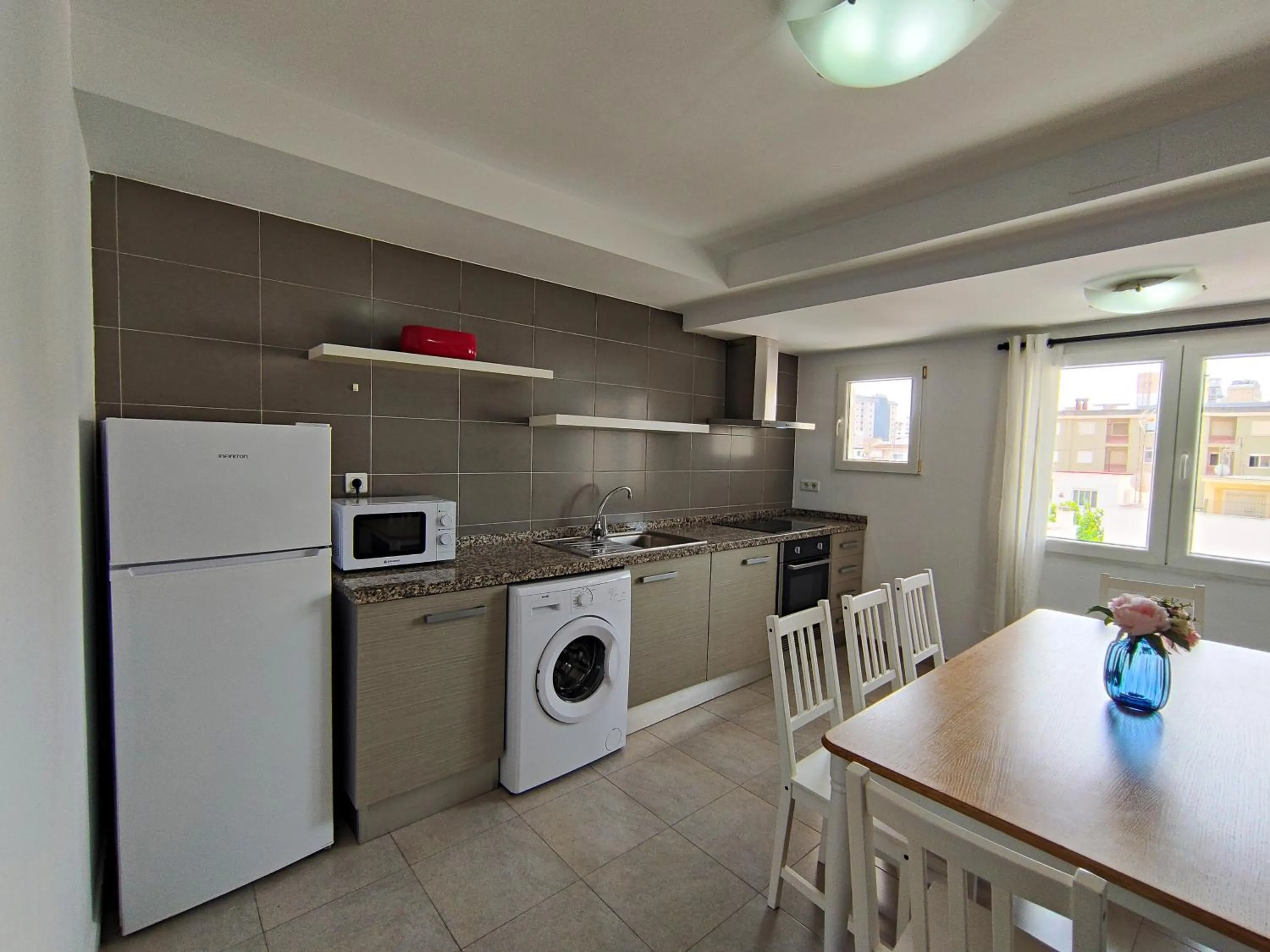 Kitchen or kitchenette in Apartamentos Gandía Centro 3000