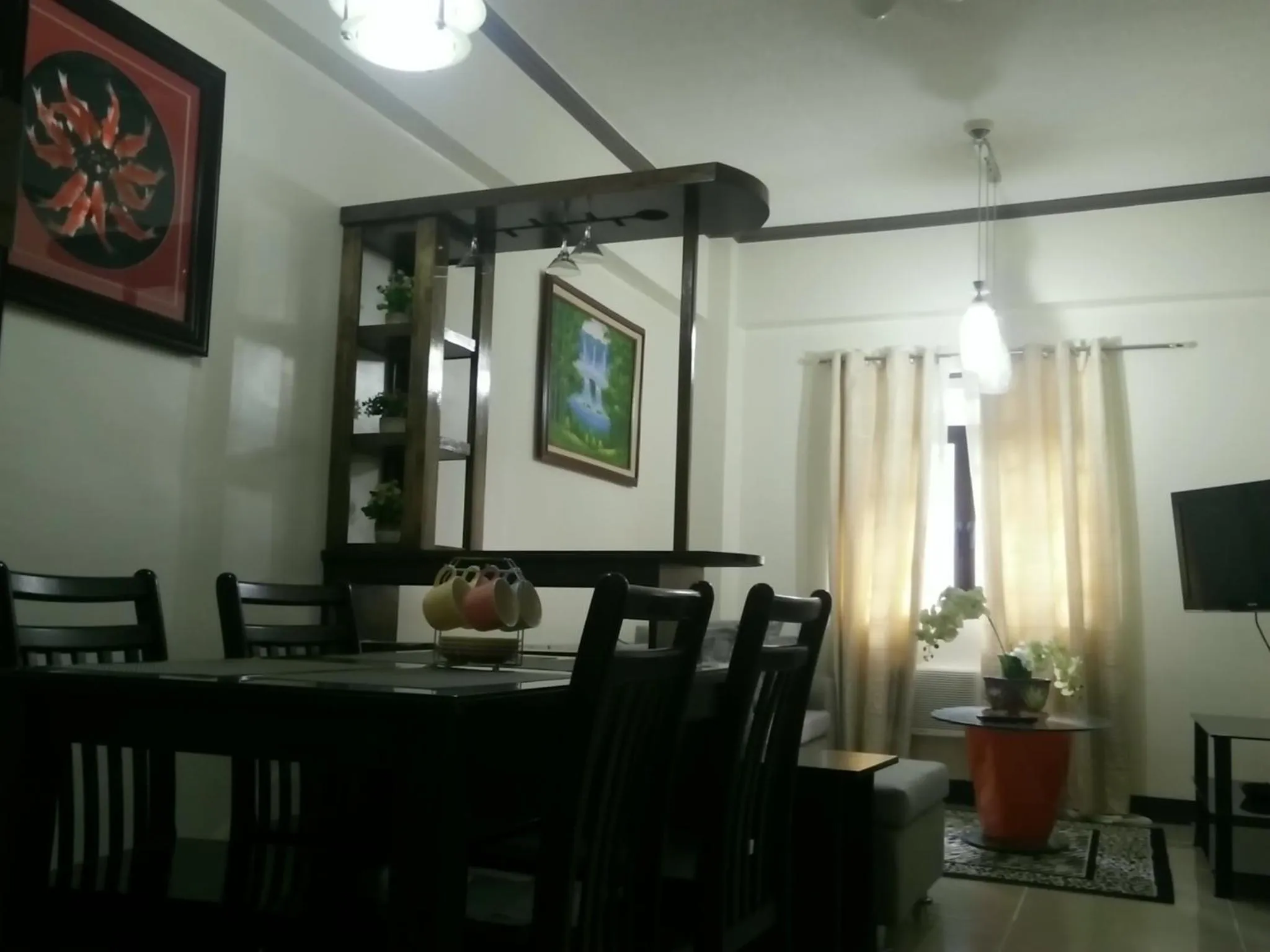 Living room in Palm Tree Genlex Condo