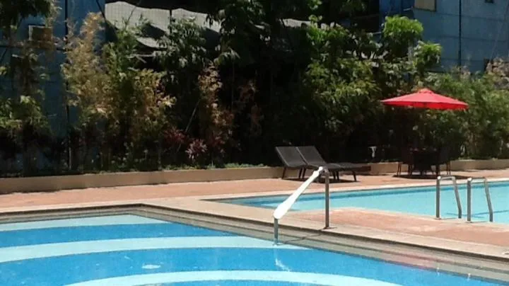 Day in Palm Tree Genlex Condo