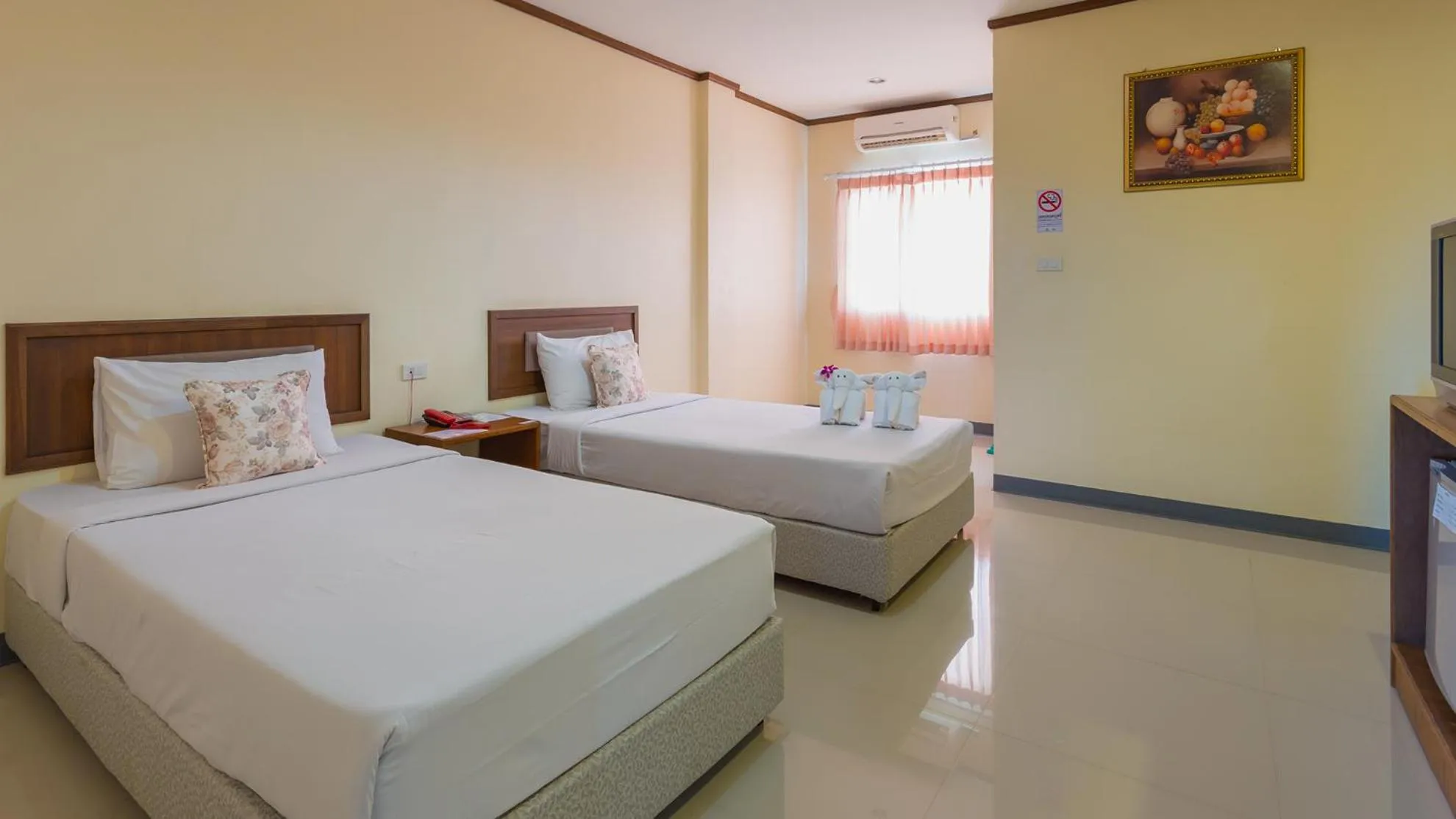 Bed in KYP Khunyuw Place Hotel โรงแรมเควายพี ขุนยูวเพลส ฝาง