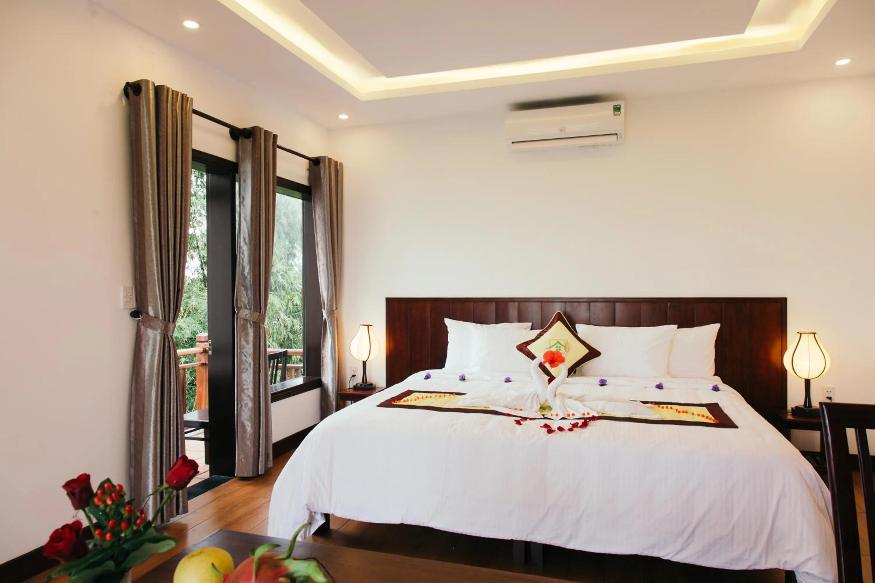 Communal lounge/ TV room, Bed in Hoi An Golden Rice Villa