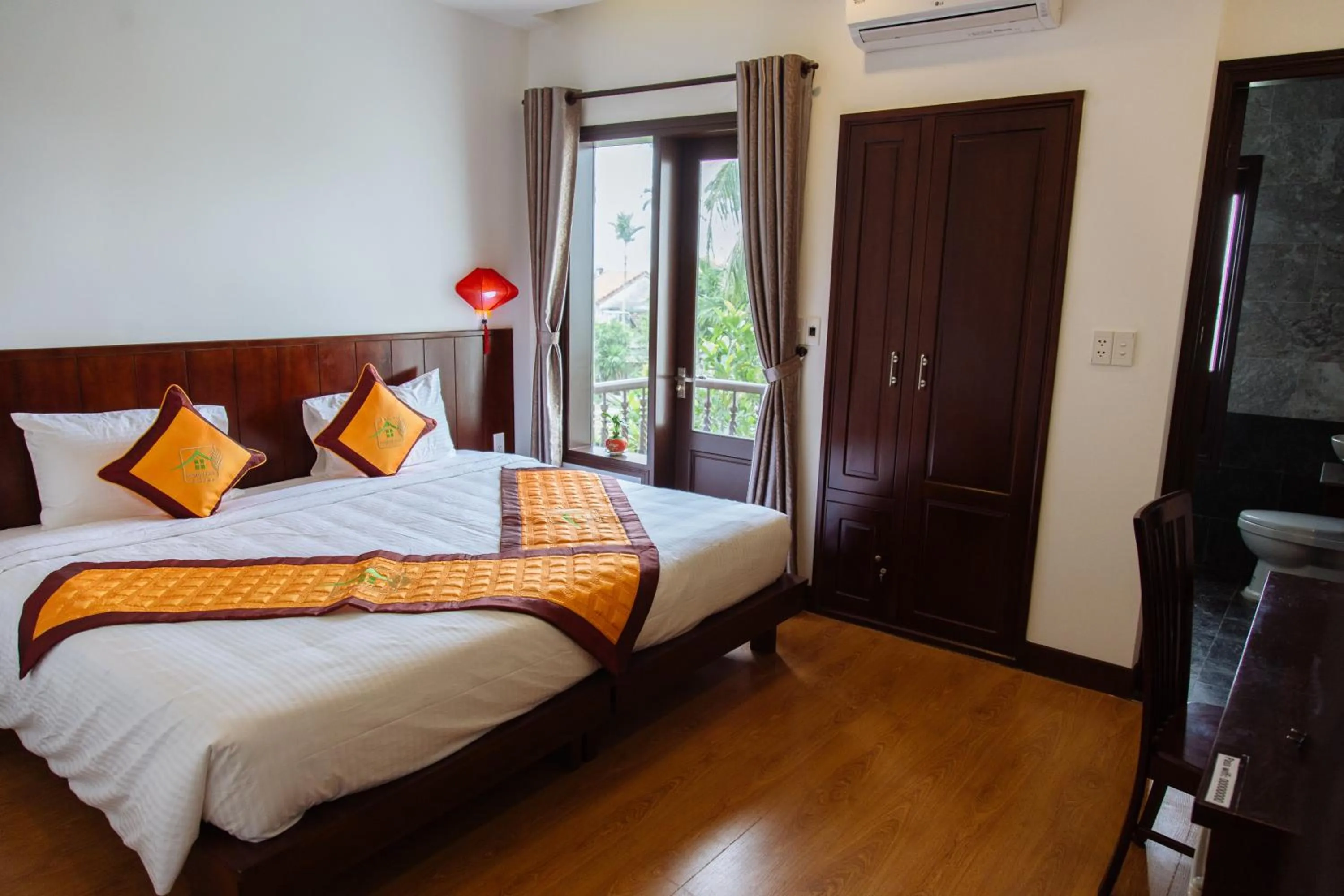 Photo of the whole room, Bed in Hoi An Golden Rice Villa