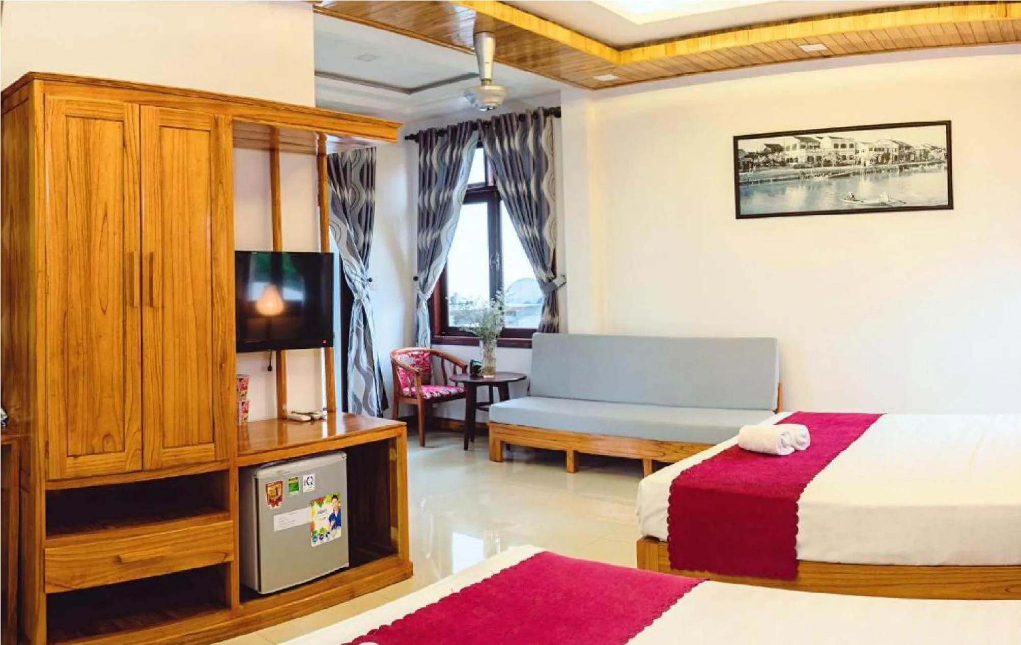 Communal lounge/ TV room, Bed in Riverside Plum Garden Villa