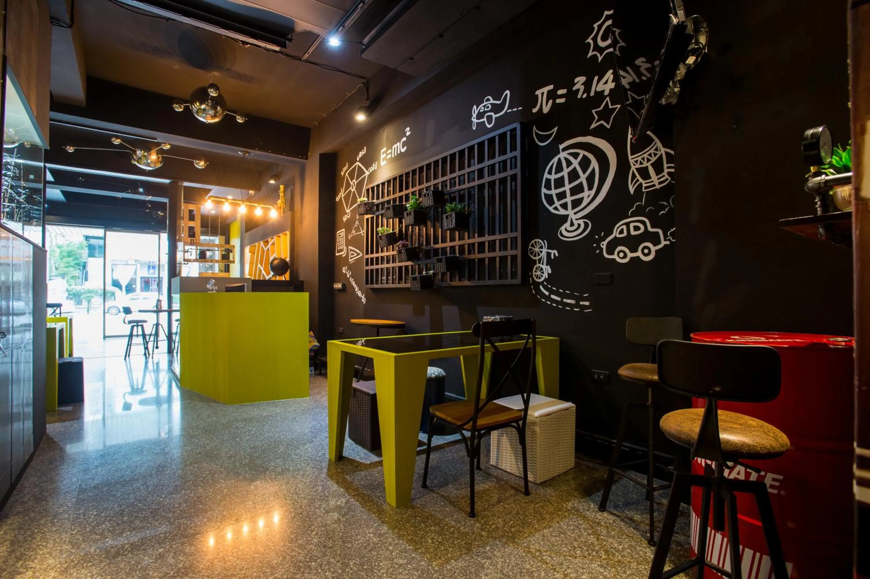 Communal lounge/ TV room in Just Walk Backpacker Hostel